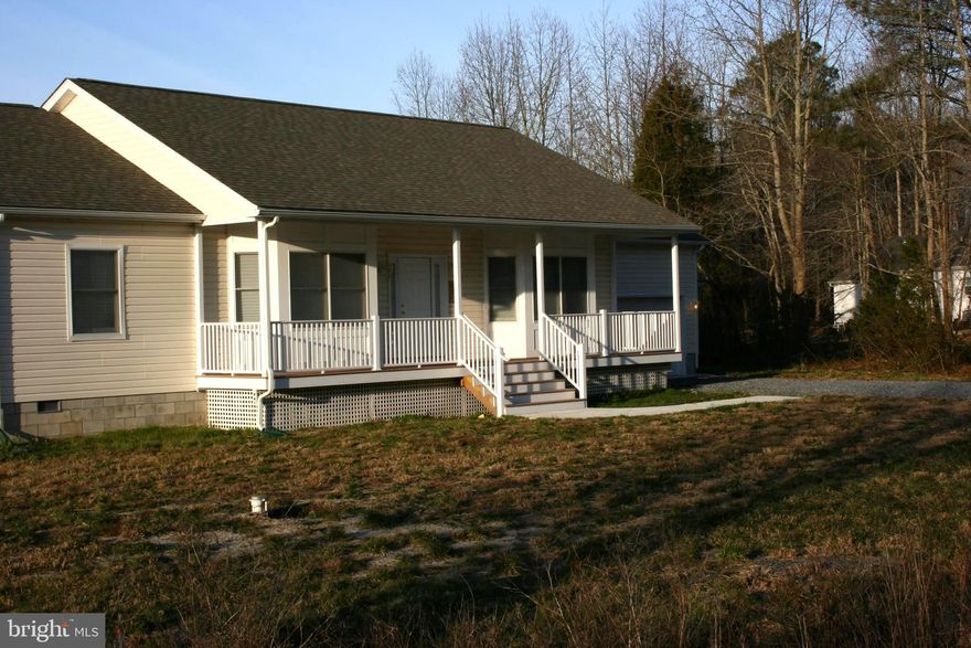 WELCOME to your private coastal retreat-where comfort, space and location come together effortlessly. This charming Ranch Style Home invites you in with a classic front porch, perfect for morning coffee or unwinding after a day at the Beach. Ideally located just a short drive to Bethany Beach & downtown you'll enjoy easy access to Coastal Hwy. 1 while still savoring the peace & quiet of a tucked -away setting. 
Set on over three-quarters of an acre, this property backs to serene woods, offering a rare blend of privacy and space. With no HOA restrictions , you'll have the freedom to truly make this home your own-whether that means adding outdoor living features, parking recreational vehicles, or simply enjoying the extra room to spread out. 
Inside , the home features three generously sized bedrooms and two full baths , designed to accommodate both everyday living and entertaining. The spacious layout supports an active lifestyle, with comfortable living areas that feel both welcoming and functional.  
Conveniently located near shopping, dining, and everyday amenities, this home delivers the best of both worlds-peaceful living with everything you need just minutes away. 
INVESTOR OPPORTUNITY: This property has a strong rental history, having been consistently rented for the past 13 years. Whether you're considering long term tenants or exploring short-term seasonal rental potential, this home is a smart addition to any portfolio.
The property is being sold "As Is", with the right to conduct inspections. For additional details, including lot dimensions, please refer to the county plat map and supporting documents.
Don't miss your chance to own a versatile , well maintained home in a highly desirable coastal location-perfect as a primary residence, vacation getaway, or income producing property. Home was renovated to increase ceiling volume to Nine(9') Feet high throughout  rendering a more spacious living atmosphere.