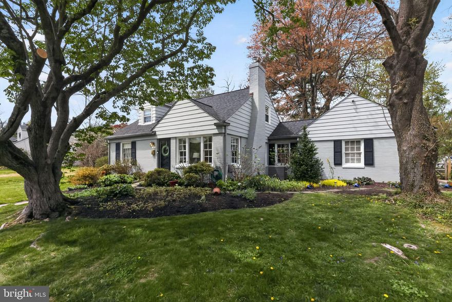 Welcome home to 303 Barry Lane, a beautifully maintained 4-bedroom, 2 full bath Cape Cod situated on a gorgeous, private 0.46-acre lot in the highly rated Wallingford-Swarthmore School District. This charming home offers exceptional curb appeal with professionally landscaped grounds, mature plantings, and stunning specimen trees.

Step inside to a sun-filled living room featuring a cozy fireplace, which flows seamlessly into the heart of the home—an expanded, open-concept kitchen and dining area. Thoughtfully redesigned as part of a 2014 addition, the kitchen showcases white cabinetry, marble countertops, stainless steel appliances, and a classic subway tile backsplash, while the dining area offers built-in cabinetry and excellent storage.

Just beyond, the spacious family room addition is the perfect place to relax, complete with a gas fireplace and direct access to the rear terrace and flat, private backyard. The family room also connects conveniently to the mudroom and attached garage, offering everyday ease and functionality.

On the main level, you’ll find a generously sized primary bedroom with ample closet space, along with a second bedroom that can easily function as a home office. A beautifully renovated full bathroom features a gorgeous vanity, stylish tile work, and a tub/shower combination.

Upstairs, there are two additional well-proportioned bedrooms and a second updated full bathroom.
The large lower level includes a finished living area—ideal for a playroom, media room, or additional lounge space—along with a utility area and laundry. An outside stairway provides convenient egress and access to the backyard.

This home has been thoughtfully and extensively updated, offering both quality and peace of mind. Major improvements include a brand new sewer lateral (2026), newer HVAC system (2022) with furnace, air conditioning, and hot water heater, and a newer roof (2022). The 2014 addition significantly enhanced the home’s layout and livability, while both bathrooms have been fully renovated to the studs with high-end finishes.

Additional highlights include hardwood flooring throughout most of the home, replacement windows, a rebuilt chimney with stainless steel liner, new electrical panel, widened driveway, and a perimeter French drain system. The professionally landscaped yard features a fully fenced backyard and a beautiful bluestone patio, perfect for outdoor entertaining. With fresh interior and exterior painting and meticulous upkeep throughout, this home is truly move-in ready.