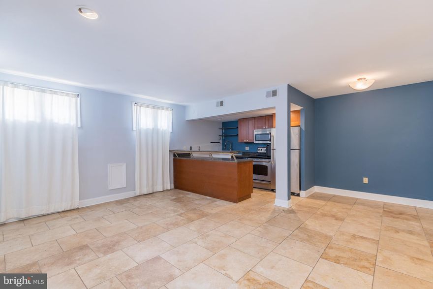 NEW PRICE! BANK APPROVED!  This is not your cookie cutter condo!!! Located in  the heart of Mt Vernon!  Over 800 F/S.  Loads of character & charm with updates throughout!  Chef's kitchen w/granite counters &  stainless appliances. Breakfast bar & farm sink.  Jetted tub.  Oversized tiles throughout.  Private courtyard.  Just  seconds from Monument.  Convenient to JHU and so much more that city living offers!