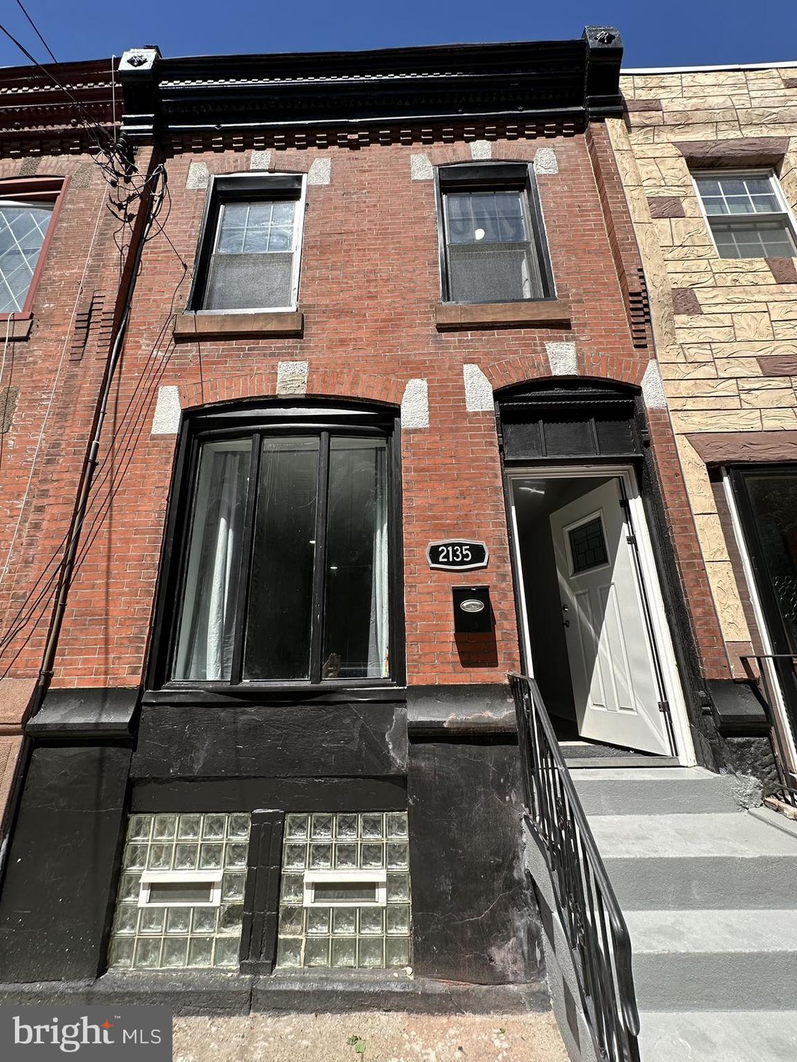 Welcome to this fully renovated 3 bedroom, 2.5 bath charm house in the heart of South Philadelphia. The first floor offers an open living room with a modern stone TV accent wall, a powder room, dining area, and shiny eat-in kitchen with granite counter-tops, tiled back splashes, and stainless steel appliances. Outside the kitchen is a brand-new backyard with a planting bed. Three nice sized bedrooms with plenty of sunshine and closets. Master bathroom boasts standing tiled shower with a sliding glass door. And a 3-piece hallway bathroom with a relaxing bathtub. Everything is new; new roof, new HVAC, new plumbing, new windows, new laminated floor throughout, new finished basement with laundry, new patio, etc. Never miss this sweet home and make your appointment today!