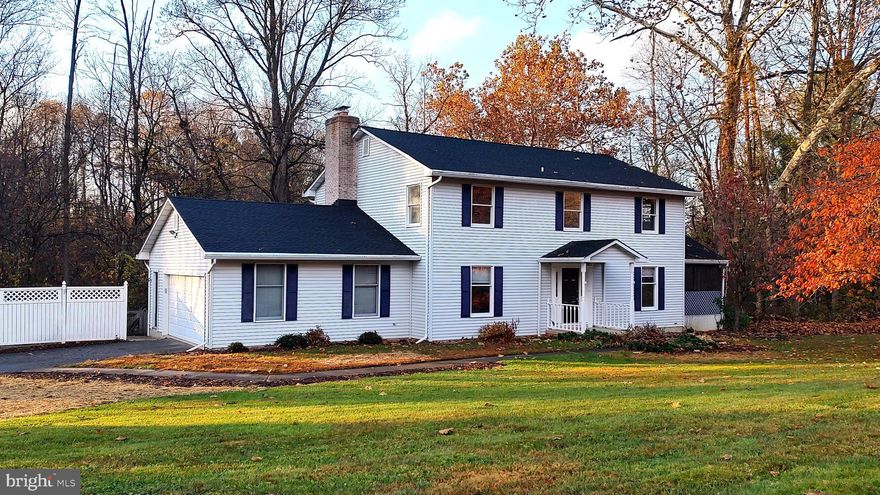 BACK UP OFFERS CONSIDERED!  CONTACT YOUR AGENT TO SEE THIS UNIQUE HOME!  Nature lover's delight! 4-5 bedroom/2.1 bathroom Colonial located on cul-de-sac court, on 3+ acre lot with woods & stream.  Large eat-in kitchen with stainless steel appliances, plus main level Office/Study/Den, Family Room with wood burning fireplace & Laundry/Mud Room. Generous sized bedrooms with bonus room (potential office/guest bedroom) on upper level.  Large basement with rough-in; water treatment system and generator included, too.  Rear deck, side screened porch & custom playground area.  Many recent updates include Flooring, Interior Painting, A/C and Well Pressure Tank (2023); Furnace and Garage Door Opener (2021), Roof and Well Pump (2020), and more!  The community (Madonna Manor) has a voluntary $10 a year fee for the Madonna Manor Improvement Association; the covenants and deed restrictions are included in the Documents section.