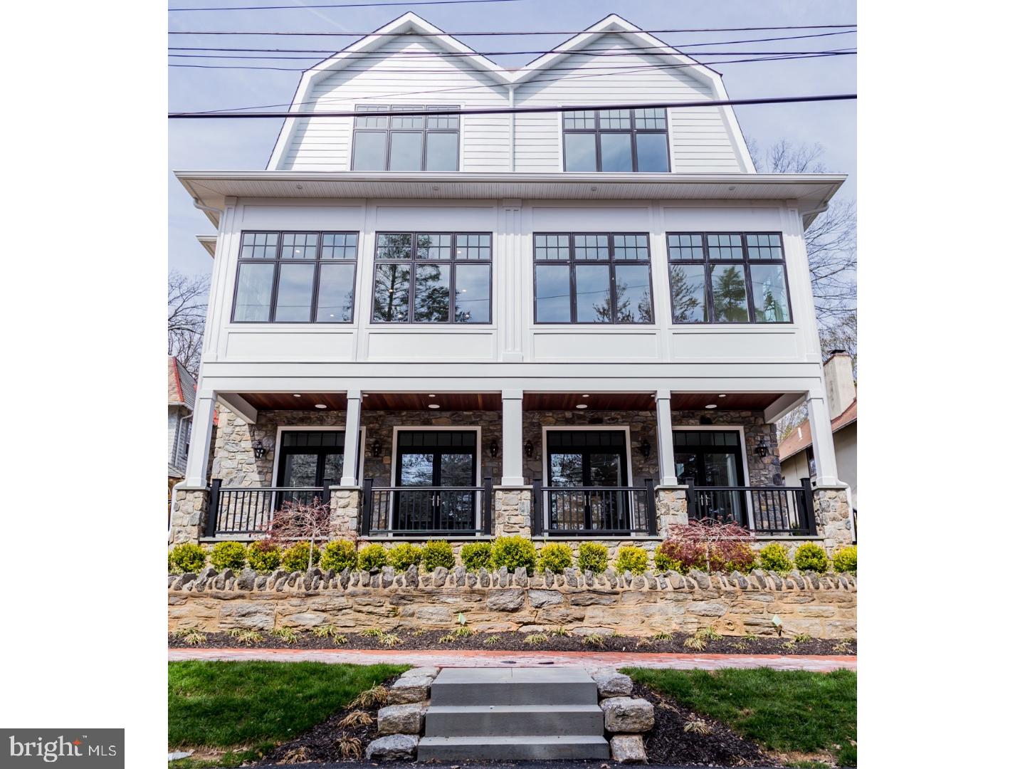 Introducing Shawnee Place ? A very special collection of 2 new townhouses in premier Chestnut Hill location that seamlessly nestle into the neighborhood as if they were built decades ago. Traditional architecture coupled with a modern floor plan make these 4 BR/3.5 BA top of the hill homes perfect for today's living. Developed by Philadelphia Design Home Builder 2014 these 3600 square foot homes are constructed with the highest quality building materials. Sprawling second floor open-concept living floor with over 1200 square feet of luxe living space. Large Chef's Eat-in Kitchen with 10 foot island with carrara counter tops, Sub-Zero/Wolf appliance package, 59" custom white cabinetry, navy blue island and wet bar perfect for entertaining. Custom built-in seating area in front of large window is perfect for daily dining. Step-out balcony. Large dining room with gorgeous mill work. Massive front living room with gorgeous coffered ceiling, optional gas fireplace and gorgeous open views of classic stone Chestnut Hill houses and leafy trees through huge windows. Upstairs enter into a luxe master suite in the front of the house with vast open views. Master Bathroom features a step-in shower with frame less glass doors and steam shower. Custom double vanity. Master BR with custom mill work, walk-in closet with custom built-in closet system. 2 additional guest BR's on the opposite end of the floor with full bathroom plus convenient laundry room complete this floor. Entry floor features a grand foyer, 4th BR with French doors leading to a lovely front porch with mahogany ceiling. Full bathroom. This would make a great in-law or au-pair quarters or a perfect home office. 2-car rear attached garage. Short walk to the shops and restaurants on Germantown Avenue, train lines and Fairmount Park trail entrance. 10 year property tax abatement and many green features make these fabulous homes very efficient and low maintenance. 25 minutes to Center City, easy access to the suburbs and highways. Premier location-Exceptional Quality-Perfect Size