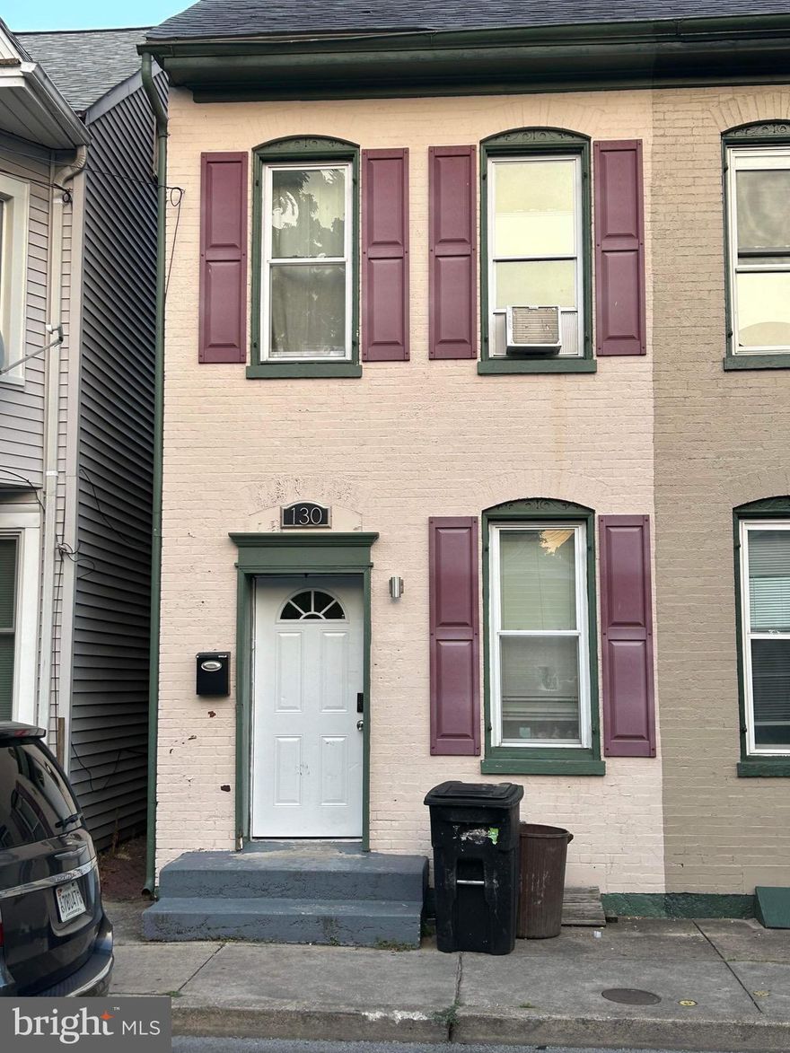 In the heart of downtown Hagerstown, this updated 1910 home features 3 bedrooms and 1 bathroom. The kitchen is recently updated with a brand new stainless steel fridge and flooring, built in microwave, and beautiful stone countertops. Upstairs features 3 bedrooms, and 1 bathroom, including a finished attic. Sale is strictly as-is.