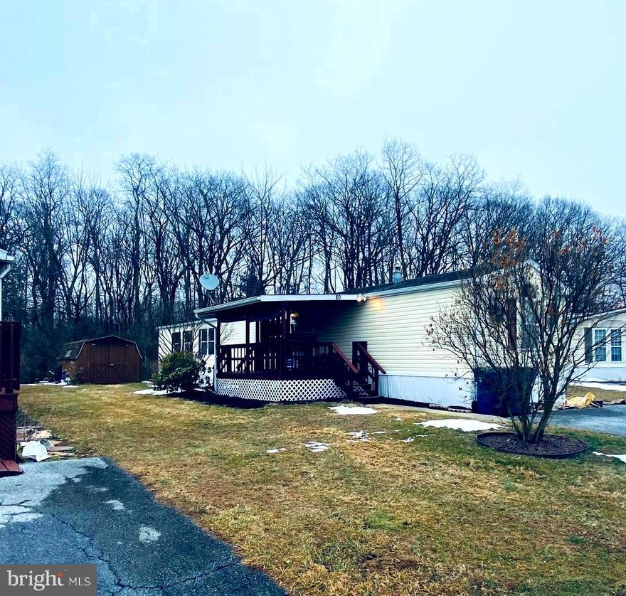 Nicely Situated Affordable Home! This 3 BR 2 BA Modular lies close to all amenities and interstates! This well maintained mobile home boasts a wood pellet stove as well as window units which heat and cool the interior nicely! This nice quiet street backs up to a wooded area which can be adorned on the covered porch for a relaxing morning coffee or friendly gatherings! Plenty of extra storage for lawn and sports equipment in the double door storage shed adorning the back side of the property. The affordable 398.00 MO lot rent covers the sewer, trash and water usage. Please come visit us for a tour today!
NOTE: Propane furnace is not in working order,owner prefers to heat with Pellet Stove and Cool with 2 Window units, included in sale.....
All current newer appliances  and window treatments will be included with purchase!