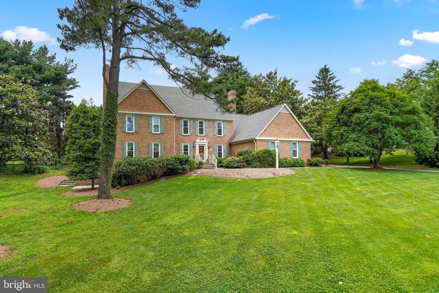 Unparalleled elegance in this quintessential Rugby Hall stately colonial. Perfectly situated in the heart of highly coveted Rugby Hall sits this brick front colonial with 3 car side entry garage on a 1 acre private lot.  3 finished levels with a large walk up attic offering 4th level potential.  Stone patio and custom pool with mature manicured grounds make this the perfect place to entertain this summer!  Step inside to elegant finishes around every turn.  Large inviting foyer with French doors to a private main level study.  Formal family room  is spacious with a decorative fireplace and flows immediately into the formal dining room.  Gourmet kitchen with  bar seating and table space flows into your open concept family room.  Double sets of doors welcome you to the backyard oasis. Powder room is off mudroom and laundry area, conveniently located near the garage entry.  Bedroom level offers the most spacious and tranquil primary suite complete with sitting area, fireplace, dual closets- one a large walk in- French doors to a private balcony, vaulted ceilings as well as an updated private super bath.  An updated, custom tiled hall bathroom and 3 additional large bedrooms, each with ample closet space, complete the bedroom level.  Don't miss the door to the upper attic level- huge potential for additional bedrooms, bath, large home office or play room- endless possibilities!  Fully finished lower level with walk out stairs to rear yard features a large rec room with fireplace, full bathroom, home gym and plenty of storage space.  Enjoy the water priviledged lifestyle along the Severn River with many amenities just a short walk away- boat slips, ramp, pavilion, playground, volleyball and much more.  Severna Park Schools!