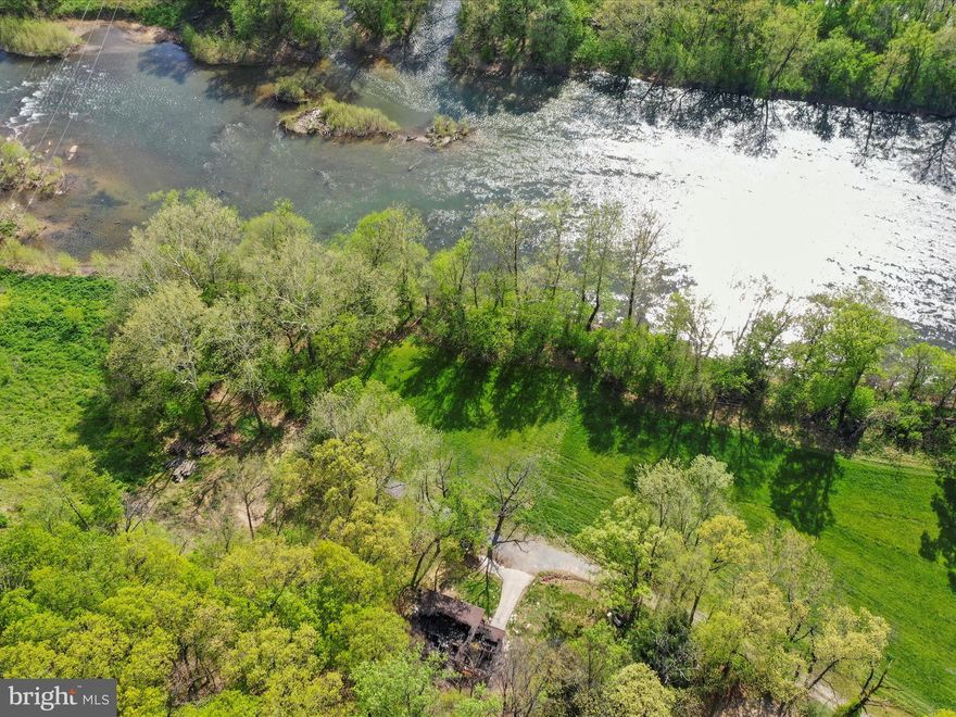 Amazing lot on the Shenandoah River.  This is the last house on the lane and ready for your own vision.  This home was a complete loss, sadly, due to fire in April 2024.  We believe the septic and well are in great shape and the foundation should be solid to build on pending county building inspection.  You should be able to go up 2 levels over foundation and create some of the most amazing views ever!  There is direct access on your lot to the Shenandoah River and the entire field along the river is in Flood Plain so will most likely stay this beautiful for a long time.  This house is OUT of the floodplain and the seller did not pay flood insurance.