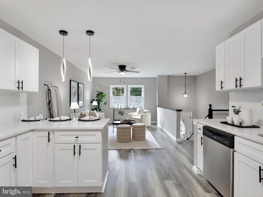 Come see this Beautiful  2 level Split foyer located in Severna Park.  The interior showcases contemporary finishes and a thoughtful layout that maximizes both style and functionality. Complete with open floor plan and modern finishes that will wow you the minute you walk through the door. The custom kitchen with quartz countertops, and stainless-steel appliances offers maximum versatility and functionality. The kitchen is a delightful space with ample cabinetry and counter space, perfect for preparing meals, opening up to a separate dining area.The bathrooms have been tastefully refreshed adding modern elegance to this classic home. Freshly painted and new carpet, flooring throughout. Relax in the spacious living room, an inviting spot to unwind after a long day. Close to restaurants and shopping adding convenience to major routes, restaurants, and entertainment. Schedule to see this amazing home today!!