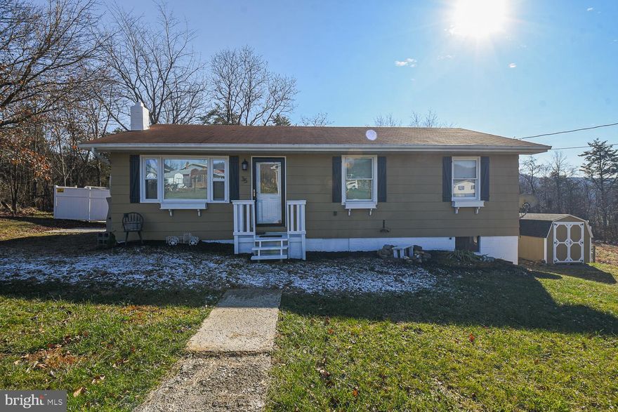 Nicely secluded house in the back end of Fountainhead Drive subdivision. This 3 bed, 1 bath home sits back in the development on a large lot backing the trees and a vacant lot beside. Tasteful updates with flooring, the bathroom bathroom and other features making this one ready to move in and start living immediately. Beautifully finished back deck. The basement offers additional living room space, pellet stove, laundry room and space for an extra bedroom, home office, etc. Plenty of storage throughout the entire home!  HOA includes your road maintenance and monthly sewer.