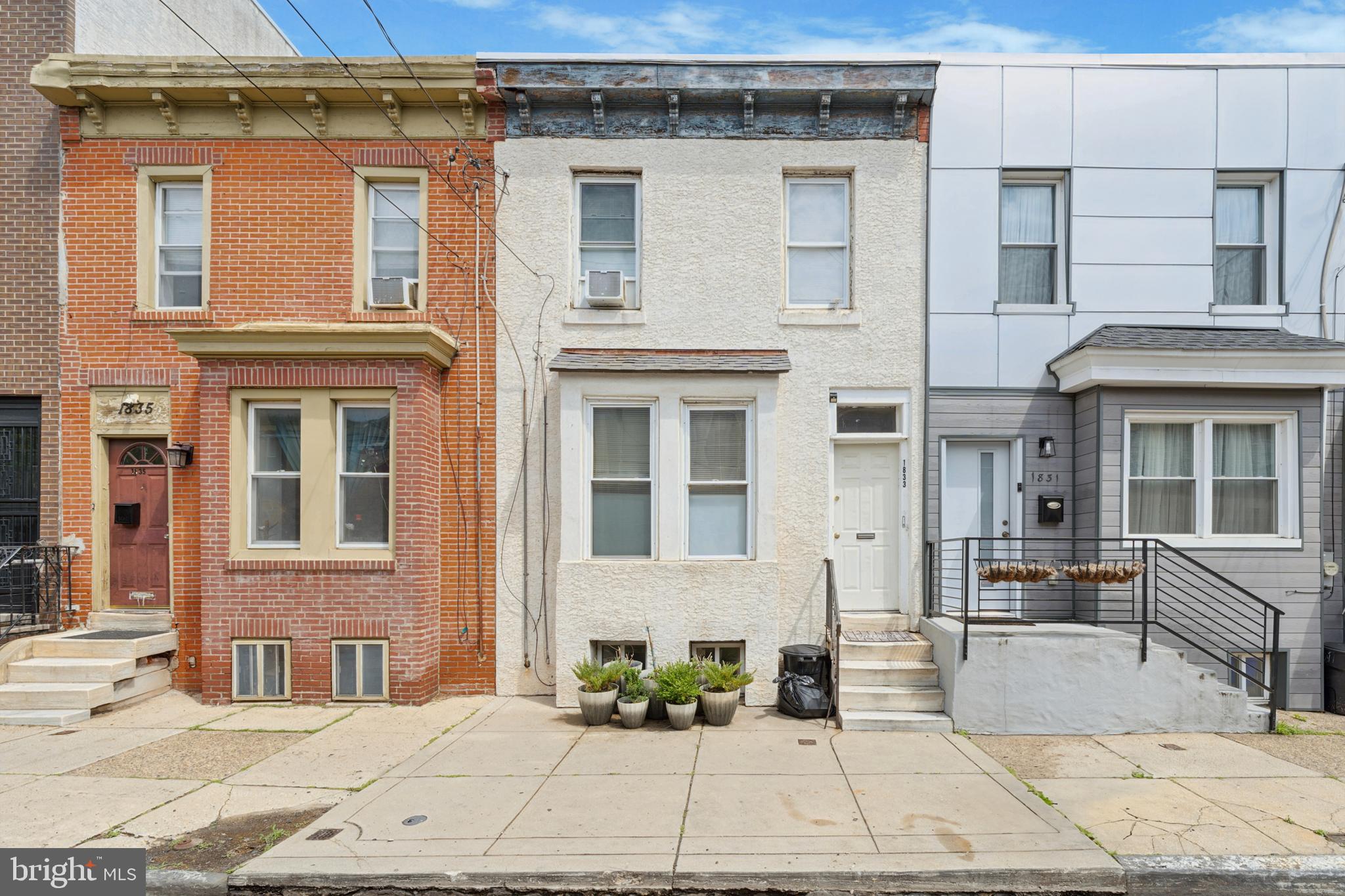 Gently lived in, recently renovated, two bedroom home in the heart of Point Breeze. All the conveniences of city life with a neighborhood charm. With a Walk Score of 91 you are within easy walking distance to a variety of cafes, eateries and pubs, Sprout's Supermarket, Target, Fine Wines and Good Spirits, the green space of Wharton Square Park and Playground and more. Easy access to public transportation. Center City is just a short bus ride away. The Broad Street subway line provides local and regional rail access. Private Yard, Central Air, Microwave, Washer/Dryer (in separate laundry room). New rubber roof installed in 2022.