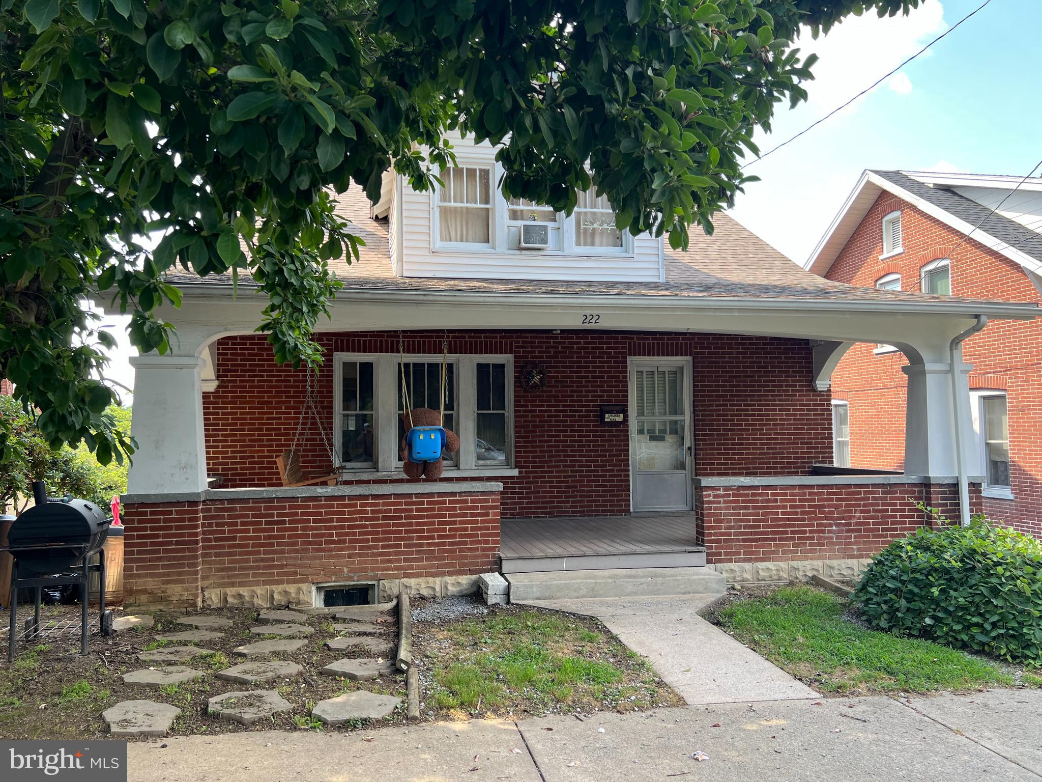 This lovely brick cape cod offers original chestnut wood trim through out the home, walkout level basement, public alley access to garage, hardwood flooring, peace and quiet in the Borough of Waynesboro, nested in the center area of town with lots of options for shopping, restaurants, convenient stores, many of these facilities are within walking distance. House roof installed 10/2024.