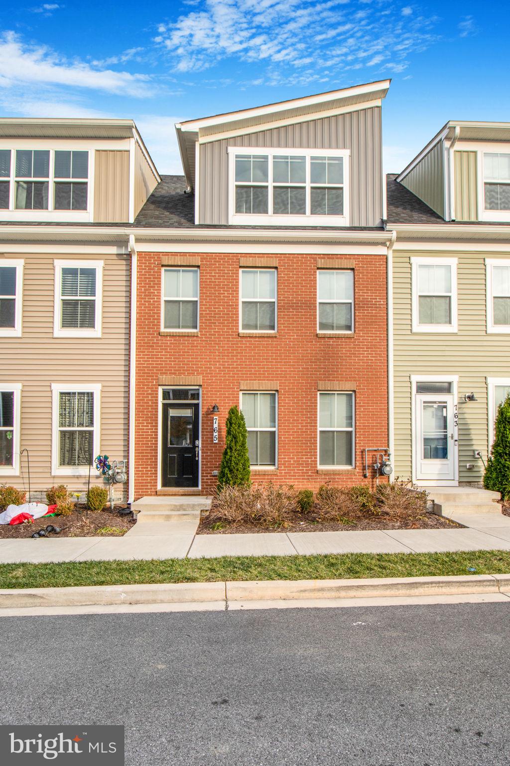 REDUCED PRICE!! Enjoy the Frederick lifestyle in this 4BED/3.5BTH contemporary townhome, with an amazing rooftop terrace, and garage parking for 2! This newly constructed 2021 home was designed and built for luxury and modern comfort by Gambrill View Community! Step inside this large home to embrace the open floor plan, tall ceilings, and perfect amount of windows producing natural light in almost every corner! Upon entry you will be greeted by the smooth oak wood floors and a deluxe kitchen with an oversized island that features bar stool seating perfect hosting your family and friends! Don’t forget to take a breath of fresh air in the green backyard area ideal for grilling this coming summer! Every full bathroom in this home is spacious with dual vanity sink! This home also features extra storage spaces, large rooms with spacious closets, recess lighting, and central HVAC! One of the great perks of this location is the proximity (1.5 miles away) to the golden mile corridor formed in 2001 serving as the gateway to the City of Frederick where you will find along the way countless retail stores, restaurants, attractions, and the Warehouse Cinemas of Frederick! When you’re not exploring everything the area has to offer find yourself relaxing and enjoying in one of the newest communities of Frederick!