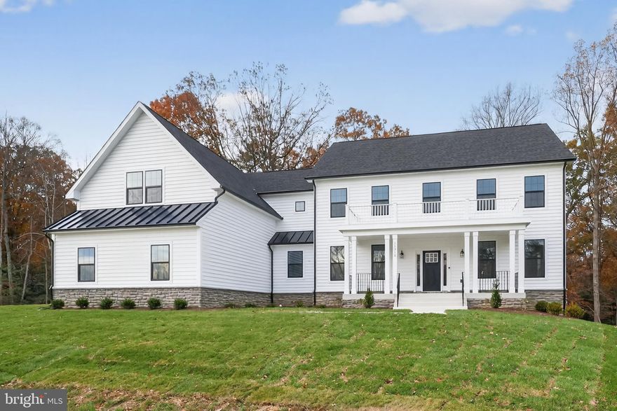 END OF YEAR SAVINGS!! Through end of December, the builder is offering a special deal on our two quick move-in homes: Get a below-market interest rate as low as 5.375% OR a rate of 5.625% with up to $15,000 in closing cost credit. That means you can save tens of thousands on your housing payments over time. (Some restrictions apply.)  Our "To Be Built" lots, take advantage of up to $35K in Flex Cash that can be used toward upgrades, closing help or rate reduction AND also get 50% off on lot premiums for a limited time only. Gorgeous "to-be-built" Patuxent Model craftsman-style home in the bucolic Retreat at Glenn Dale community, by acclaimed builder Ness-Twigg.  With 1/2 acre and 1 acre lot options on a quiet culdesac surrounded by mature trees, this community with NO HOA is ideally-located just minutes from DC, Annapolis, and Ft Meade but with the peaceful serenity of sought-after Glenn Dale. The base Patuxent includes 4-beds, 3.5-baths, nearly 6000 sq ft and a 2-car garage, expandable up to 6 beds, 5.5 baths, over 6200 sq ft and 3-car garage! Luxurious details throughout include 9-ft plus ceilings on every level, craftsman-style window casings, elegant crown molding in kitchen, Kohler plumbing fixtures and Schlage interior handles. Main level boasts open-layout with wide-plank BJELIN Woodura Hardened Wood floors throughout – Scandinavian-designed and ethically-sourced wood floors that are 3X stronger and nearly water-proof as compared to traditional hardwood floors. The two-story open-loft Family Room with optional wood-burning fireplace and the adjacent luxurious kitchen are the focal point of this home, offering quartz or granite countertop options, high-end stainless steel Bosch appliances including French-door refrigerator, Kohler designer faucet, customizable cabinets, recessed lighting, large island with pendant lighting for entertaining, and subway tile backsplash. Aspiring chefs will love the massive walk-through pantry!  A formal dining room, living room, powder room, mud room with built-in storage cubbies and optional second entry, and a library or in-home office, complete the main level. The optional main level Bedroom Suite with walk-in closet and ensuite full bathroom with standing shower offers single-level living flexibility. When ready to unwind, head upstairs to the spacious Owner's Suite with tray ceiling, dressing room with two walk-in closets, optional electric fireplace and en-suite bath with Sterling Ensemble tub, standing shower with Schluter®-Kerdi waterproofing system, Kohler fixtures (customizable colors/finishes), ceramic tile floors, and two vanities with choice of quartz or granite countertops.  Three additional light-filled bedrooms and two full baths plus laundry room with utility sink and storage located on this upper level.  The versatile lower level can be designed to meet all of your needs, including a potential 6th bedroom and additional full bath, large rec room, multiple storage rooms/dens, and an areaway for walk-up access to the rear yard. Energy-efficient and top-of-the-line features, including lifetime Tamko® Titan XT Premium Architectural Roof, high-efficiency Carrier HVAC, "maintenance-free" low-E argon windows and Variform® siding, Energy Star water heaters, oversized 400-amp electrical service, Masonite® Winslow insulated fiberglass front door, Aprilaire humidifier, R49/R21 insulation package, and Barricade® Wrap Plus™ Ultimate protection against wind and moisture. Level 2 electric car charger included! Relax on the optional composite rear deck or screened-in porch, customizable in size and layout, overlooking a landscaped backyard with tree-lined views, perfect for outdoor enjoyment! Multiple upgrade and customization options allow you to build a truly one-of-a-kind home including full front porch with metal roof, several flooring size and color options, designer tile and fixture selections, and more! List price is base price for Elevation 1 home.