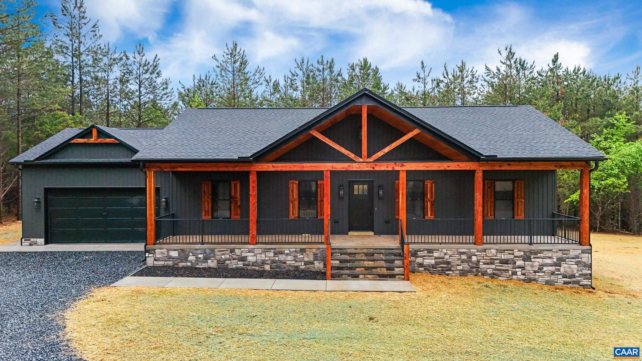 Stunning New Construction Home on 3-Acres with easy access to Lynchburg, or Charlottsville. This stunning 3 Bedroom, 2 Bath home with oversized 2-car garage features an exquisite 50x11 rocking chair front porch with luxurious wood detailed ceilings, chic colored board and batten vinyl, cedar columns that will warmly welcome you and your guest's home. Notable features include energy efficient HVAC, luxury vinyl plank floors, upgraded quartz, upgraded soft close cabinetry, all stainless-steel appliances, tiled primary bath, upgraded lighting, oversized laundry room with room for a drop zone and other carefully crafted details. Enjoy the spacious back deck for gatherings while you look out over your beautiful level property. There is room for a future pool or outdoor buildings. Come see luxury in Buckingham and be ready to call 852 MT RUSH your new home.,Quartz Counter