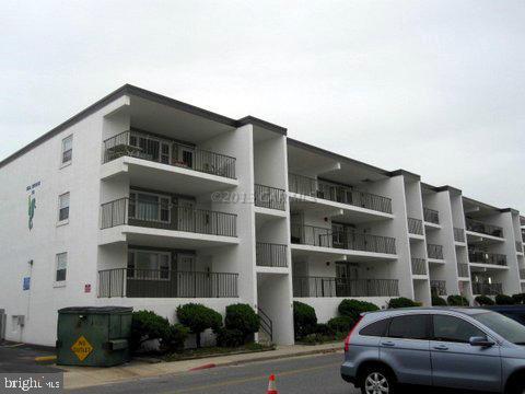 Never rented, top floor west end, faces south, large private balcony, freshly painted, new carpet in Oct 2013, perfect mid-town location, walk to all OC hot spots, steps to beach. Storage closet inside & out, 2 assigned parking, CATV in condo fee, SHOWS GREAT!!Price reduced to sell.