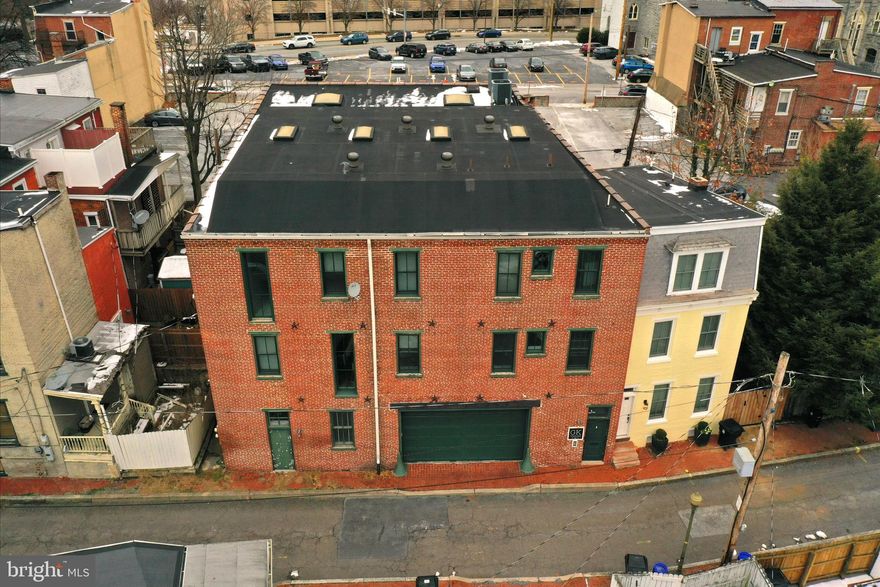 Endless possibilities await at 933 Rose Street, a uniquely flexible property in the heart of Midtown Harrisburg and very close to downtown Harrisburg. Currently utilized as an office, the building is well suited for professional office space, a full residential home, Airbnb/short-term rental, or a hybrid live–work setup. With generous space and adaptable layout, the property can function as 5 or even 6 bedrooms, depending on how rooms are configured.

The second floor features two half bathrooms along with a convenient second-floor laundry area, ideal for both residential and guest-use scenarios. The third floor offers an impressive living space with an open-concept layout, including a kitchen, living room, full bar, and a beautifully finished tiled shower bathroom with a double-bowl sink—a perfect setup for entertaining, private living quarters, or short-term rental guests.

Additional highlights include two separate heating zones for efficiency and comfort, as well as an integral garage, providing secure indoor parking—an exceptional bonus for properties in the city.

Whether you’re an investor seeking a high-demand Airbnb or rental property, a business owner looking for a functional office with private living space, or a homeowner in need of a versatile layout, 933 Rose Street offers unmatched flexibility, space, and opportunity.