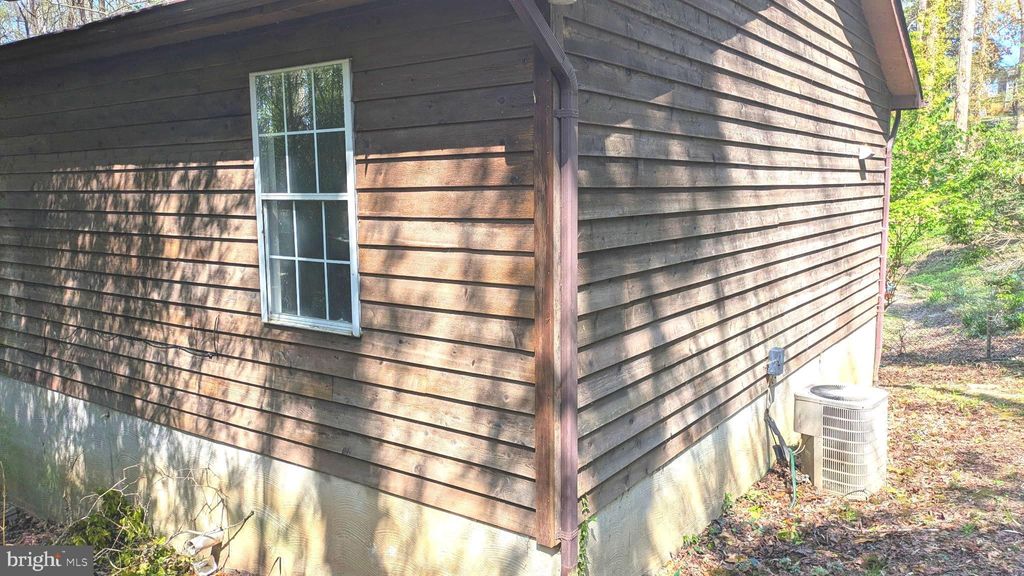 Photo of 5860 Lilac Circle, SAINT LEONARD, MD 20685 (MLS # MDCA2026444)