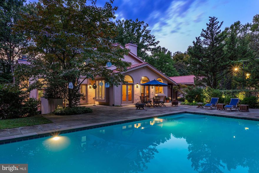 Tucked away on more than six acres of land - the largest property inside the beltway - this spectacular, secluded hilltop estate is truly an oasis in Bethesda. A private drive leads to the wooded retreat featuring a light-filled and open Mediterranean-style home with tennis courts and heated pool. The house features a chef's kitchen, formal living and dining rooms, 4 bedrooms, 4.5 bathrooms, family room, rec room, 2 car garage, parking pad for 20 cars & much more.