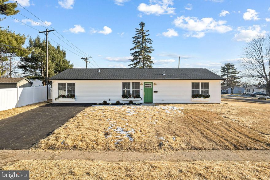 Proudly presenting this fully renovated and expanded 4-bedroom, 2-bath ranch-style home providing 1,400 sq. ft of interior living space with a primary-suite on an over-sized corner lot in the Greenbrook section of Levittown. Combining modern sophistication with timeless charm, this property is ready to meet all your needs. This rarely offered, single floor living home, merges convenience with designer touches! The inviting curb appeal begins with the new driveway and new concrete walkway to your new home. Once entering you will appreciate the attention to detail and custom finishes with a chair rail and engineered bamboo vinyl planked flooring throughout. The gourmet kitchen with custom wood white shaker cabinets is adorned with a high-end subway tile backsplash, rich quartz countertops, stainless-steel appliances and built in pantry cabinet. An expanded floor plan offers an open concept living and dining area, perfect for entertaining or family gatherings. Entering the living room are stunning wide-plank bamboo floors, abundant recessed lighting, electric fireplace, and French doors which open to a newly poured concrete pad leading to the large backyard. The over-sized yard provides an ideal area for relaxing, summer barbeques and outdoor family fun. You will appreciate your large primary-suite offering an en-suite bath, walk-in closet, and a ceiling fan. The primary bathroom provides a stall shower surrounded by ceramic plank walls and floor and a quartz topped designer vanity. The remaining three generously sized bedrooms provide ample room, closet space, and ceiling fans. The complimentary hall bathroom provides a tub shower garnished with subway tile, ceramic planked floors, and designer bowl vanity with quartz top. The hall closet allows for additional storage needs hidden behind the designer glass doors. The laundry closet includes a stacked full-size washer and dryer with those same beautiful doors. Every detail has been meticulously updated, from the new roof to the sleek flooring and everything in between. New roof, new siding, new driveway, new concrete patio/walkway new double hung windows, new HVAC / Central Air system, full size stacked washer/dryer, new wiring / 200 AMP service, new insulation, new drywall, bamboo floors, and designer exterior/interior doors. Conveniently located near shopping, eateries, and easy access to parks and major roadways, this home truly has it all. Home Sweet Home!!! You will not be disappointed, make your appointment today!!