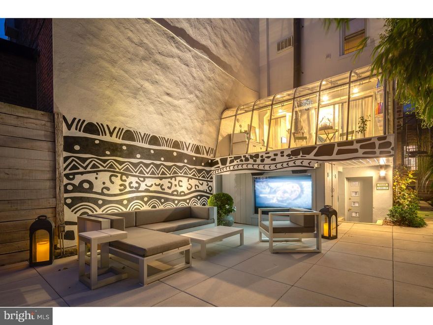 Pine-Delancey 2 car parking. From the moment you walk into this beautiful home you will understand the true meaning of opulence. The home was designed by Leslie Hayes Interiors in 2016, after a full renovation of the home was completed with all systems having been updated. You will see the custom sculptured moldings and woodwork that are revealed throughout the home. To the right of the main entry you enter into the brand new state of the art working kitchen. The bright Mediterranean colors with 24 karat gold fixtures brings life to this modern kitchen. State of the art Miele and Liebherr appliances will allow you to put together some fabulous meals for you and your family. From the kitchen you are connected to the main living area of the home which has 10 ft+ceilings with brand new surround sound speakers and recessed lighting. The living room has an attached glass solarium looking out to your private fenced in backyard. The master bedroom has 15 ft ceilings with custom built in closets with LED lighting installed. Included in the master bedroom area is the entrance to your very own private master bathroom and library. The custom closets and cabinets in the changing area were built and designed for you to have everything at your fingertips. Any gentleman or lady that needs to get away or have that quiet time to themselves can sit down and relax in their private library/office. The lower level of the home has 2 large bedrooms and 2 full size bathrooms. The media room is the most exciting room for you to watch a movie in. Custom built in couch with a full service wet bar. Walk out to the rear of your home and you will have access to the yard of your dreams. The fenced in secluded paved yard has been renovated with built in grill, deck and fire place.