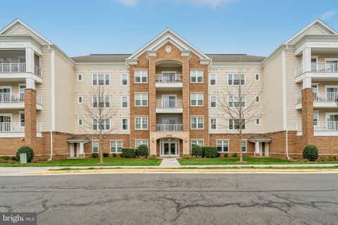 Photo of 20515 Little Creek Terrace #101, ASHBURN, VA 20147 (MLS # VALO2130952)