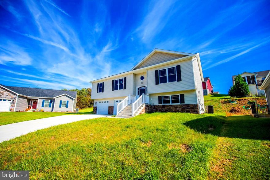 YEAR END SPECIAL. Reduced Another $5,000 PLUS $5,000 OF BUYER'S CLOSING COSTS  PAID with PREFERRED LENDER !!  Move in Ready Open Floor Plan, w/over 2,000 square feet of finished. 12X14 Deck / Upgraded LVT Flooring Throughout the Main Living Areas / Granite Counters & Stainless Steel Appliances / Upgraded Windows & Doors / Custom Two Tone Interior Paint / On a Quiet cul-de-sac in an Upscale Development with Curb and Gutter & Sidewalks