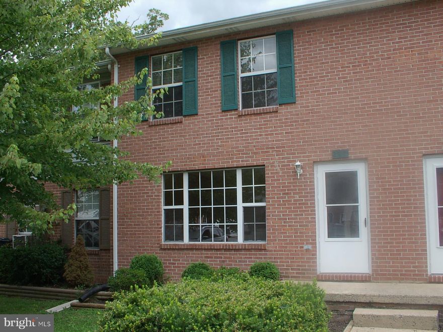 Larger than normal, 1200 square feet. One of the nicest renewed townhouses I've ever seen. All refinished hardwoods and new vinyl floor in the kitchen. All stainless steel appliances. Dryer and SS tub washerUpgraded electric stove w/7 burner choices and convection oven.  HUGE deck that borders a park like setting which is free use common area. Heat pump/central air.  Large living room window and new front door and casing. Living room (15X16) and master bedroom (13X16) larger than normal. End unit retired gent is very nice. You're going to think this townhouse was just built, it looks so good. Owner is agent.