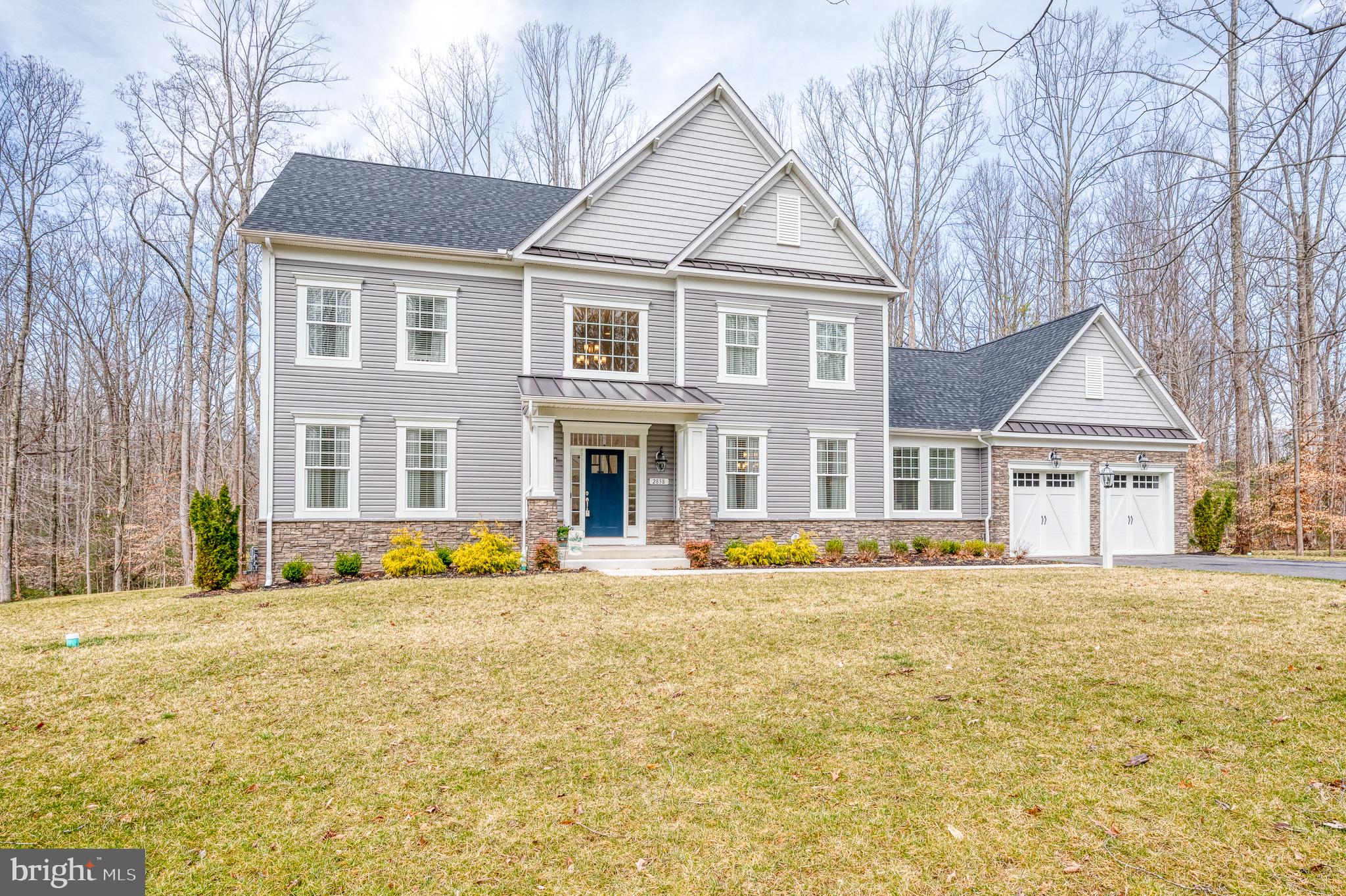 Welcome Home to this gorgeous custom built Colonial with two-story foyer. This beauty shows like a model! Located in the exclusive Blue Heron Estates, just a short drive to downtown Annapolis, and built on nearly an acre of private, wooded land that backs up to preserved forested area. Boasting over 3600 square feet of finished space, this home features 4 bedrooms, 2.5 baths, Dining Room, Office, a Gourmet Chef’s Kitchen with Granite countertops, oversized island, Stainless Steel Appliances, upgraded Cabinets, and a gorgeous Marble backsplash, flowing into the Family Room with Stone Surround, Vented Gas Fireplace. 5” Wire Brushed Hickory Wood Floors, Craftsman style Wood Trim and moldings, and oversized Mudroom/Laundry with an attached Flex space. The serene and quiet backyard, opens to preserved forest, with a covered, screened-in porch with Trex Decking, fan and lighting, with steps down to lighted Stone Patio with built-in seating for entertaining. A spacious Primary Suite, has a huge walk-in closet, with large bathroom that boasts a corner soaking tub, and separate tiled shower, along with water closet. Basement is ready to be finished to suit your needs. The home also has a full water treatment system. ***Seller prefers a 60 day rent back.***