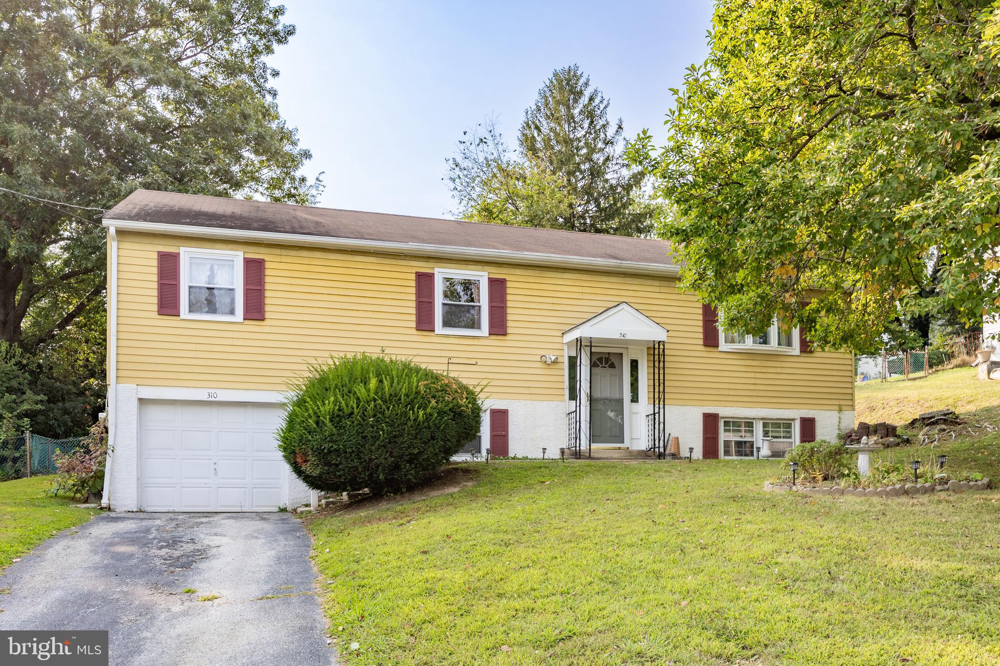 Welcome to Buchanan Drive! This well-maintained bi-level home, situated on a scenic hillside with beautiful views, is being offered for the first time by its original owner.
The main level offers three bedrooms, an eat-in kitchen, and a formal dining room with access to a deck overlooking the backyard. The lower level features an attached garage with direct entry, a laundry room, powder room, spacious family/bonus room, and an additional bedroom that may also serve as an office or guest room. Conveniently located within walking distance to the Amtrak station and bus transportation.
This home is ready for your personal touches—schedule a showing today!
Buyer is responsible for U&O and Sold in AS is condition.