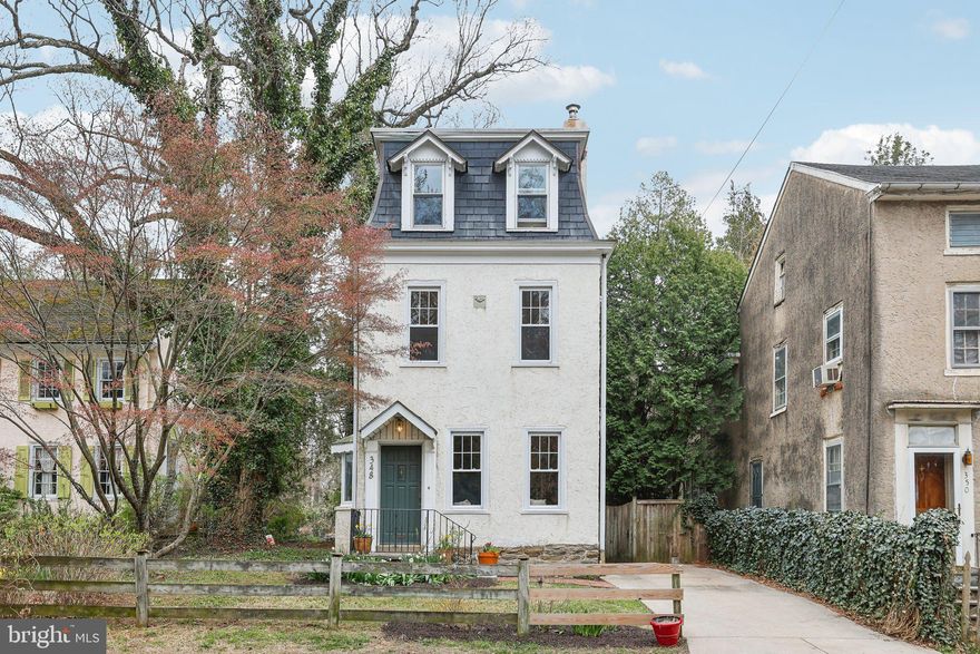 Welcome to this beautifully updated and meticulously maintained single-family home, perfectly situated on a rare double-length lot with a spacious, landscaped backyard—ideal for outdoor living and entertaining. From the moment you enter, you're greeted by warm natural wood flooring, a soothing neutral color palette, and an abundance of natural light throughout. The inviting living room offers a cozy atmosphere with built-in shelving and oversized windows that flood the space with sunlight. The adjacent dining room continues the theme with generous proportions, more large windows, and charming built-ins that offer both function and character. The updated kitchen features plenty of crisp white cabinetry, ample counter space, a double oven, and a sleek cooktop—perfect for preparing meals and hosting gatherings. The heart of the home is the stunning family room, boasting vaulted ceilings, a wood-burning fireplace, and windows on three sides that bring the outdoors in. A built-in buffet offers more storage and connects seamlessly to the kitchen offering a casual dining area for everyday living. French doors open to a large back patio and the expansive, beautifully landscaped yard. A convenient half bath completes the functional main level. Upstairs, the hardwood flooring continues into two generously sized bedrooms that share a full, updated hall bathroom. On the top floor, the private primary suite features more hardwood floors, a spacious layout, and a serene ensuite with a dual vanity. The full basement offers endless possibilities—ideal for storage or easily finishable into additional living space—along with a new washer and dryer (installed in 2021). A private driveway makes parking easy. Comfort is ensured year-round with newer Mitsubishi Hyper-Heat mini-split systems on the main level (installed in 2023) and a Carrier central air heat pump system serving the two upper floors (installed in 2021). Located directly across from two Wissahickon Park system trailheads, this home is a nature lover’s dream—perfect for hiking, biking, dog walking, and even horseback riding. Enjoy the convenience of being just minutes from the Allens Lane SEPTA station, offering quick access to Center City Philadelphia. This is more than just a home—it’s a lifestyle. Don’t miss your chance to make it yours!