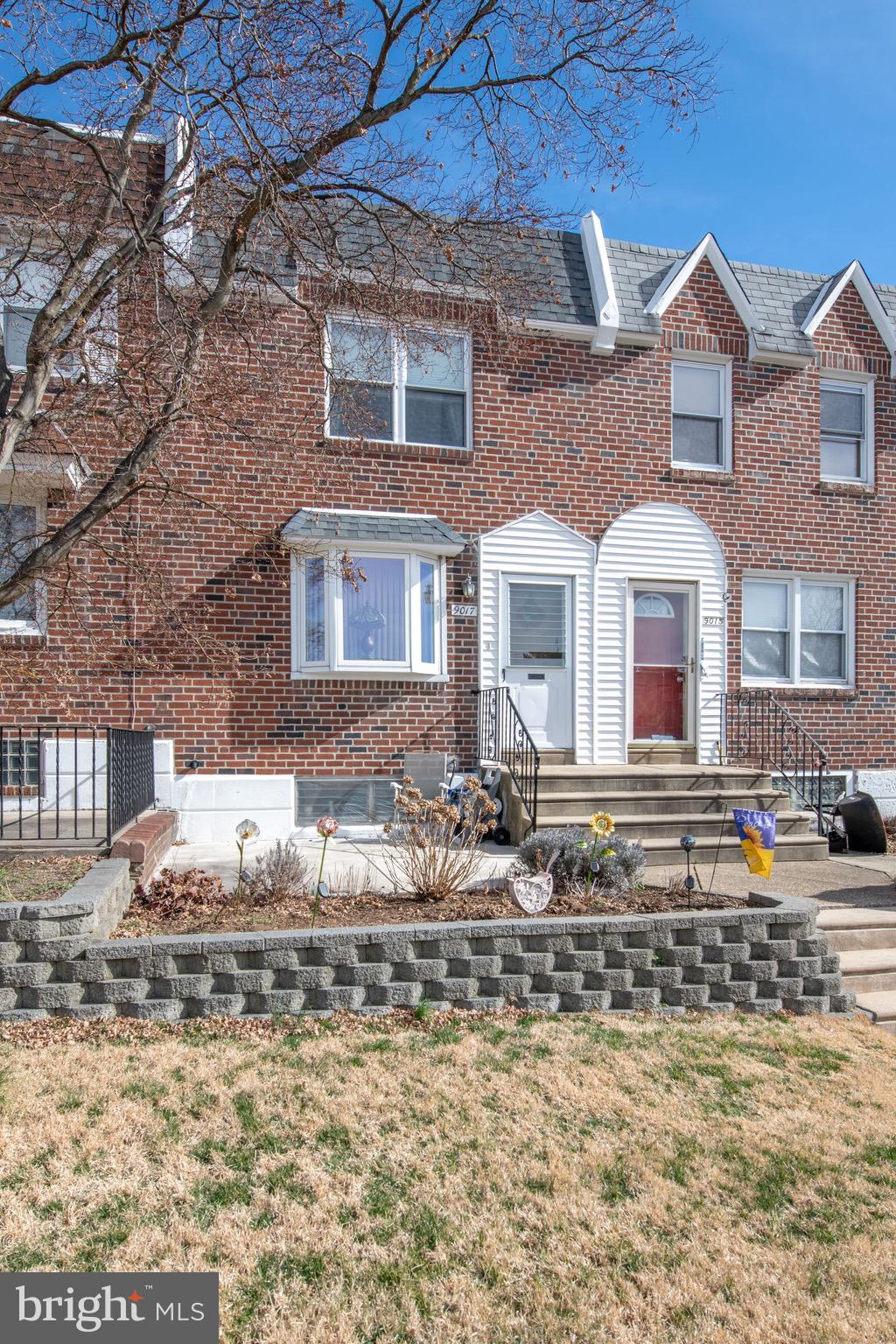 Just listed this awesome well maintained AirLite home in highly desired Crispin Gardens section of NorthEast Phila. Lovingly cared for by current owners for over 50 years. As you approach take notice of the spacious front yard & the front yard garden with pavers.  Along with a nice-sized concrete front patio, perfect for relaxing, redone in 2021.  Also check out the beautiful bow window & area above it,  re-shingled in 2021. Upon entering you will find a spacious living room, nicely carpeted with a coat closet and beautiful built in wooden bookcase. Proceed thru to the formal dining room where many family gatherings and wonderful meals have occurred.  This room has upgraded lighting, a  fabulous window  and a gorgeous built in china cabinet/buffet. Matching dining room furniture also included with two leafs to extend table.  Enter the kitchen with upgraded quartz counters, beautiful Tiffany lamp, built-in microwave, gas stove, toaster oven, built-in mini TV with radio and CD player, refrigerator, garbage disposal and dish washer. Plenty of cabinets here for storage. Floors in living room, dining room and all 3 bedrooms are currently carpeted but have Hardwood floors underneath carpeting. See inside closets upstairs in bedroom to view the wood. Proceed upstairs to the primary bedroom on the right. This room is very large, has plenty of natural light from the two large windows, also has 2 closets, a ceiling fan, and a built in area for a bedroom bureau. Down the hall, the second bedroom is a good size with a nice closet and an updated window that tilts in for easy cleaning. The third bedroom has a window and deeper closet for extra storage. The hall bathroom is tastefully updated with tile floor, shower/tub and linen closet. Also has a skylight for extra natural light. Next onto the Basement. There is a Finished area in the basement perfect for relaxing, a Home Office or Gym. The bathroom in this level has a new toilet Only. Nearby laundry room has a double basin, top loading washer, front loading dryer. Here you will find a convenient access door leading to the one-car garage. There is also a rear exit door leading to the back driveway and garage.  Out back, the detached rear yard across from rear driveway has been recently converted to a concrete pad for Extra Parking. This  home has a rare opportunity & huge  benefit of parking  for 4 cars - 1 in garage, 1 in back driveway, and 2 (depending on size of vehicles) on concrete rear yard across from driveway.  There is additional shared street parking in front of home.  Note* *Gas Heater and Central Air Unit replaced in 2020** Roof replaced in  2010 and recoated regularly after.  Also note front steps are Shared.  This property is in a great location, with nearby public transportation, baseball fields, playgrounds, shopping, & restaurants.  Perfect for commuting & easy access to center city  -Conveniently located  not far from I-95 or the Roosevelt Boulevard .  Also just a short drive to beautiful Pennypack Park. This awesome Move-In Ready home won’t last, schedule your showing before it’s gone!