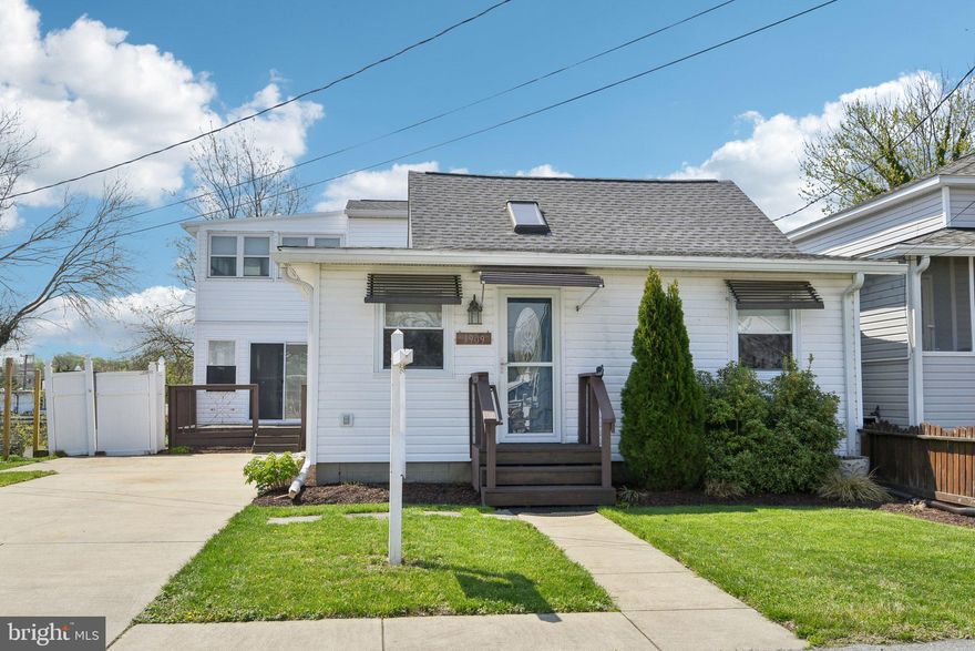 Charming 4-bedroom, 2-bath home tucked away on a quiet street in the heart of Chesapeake Beach. This coastal retreat offers a flexible layout and an unbeatable location just steps from the Chesapeake Bay. The upper level is dedicated to a private primary suite featuring a full bath and an attached enclosed porch—perfect for morning coffee or unwinding with views and fresh bay breezes.

The main level includes three additional bedrooms, a full bath, and a sunroom that adds bonus living space for relaxing, entertaining, or play. The thoughtful layout provides great separation between the primary suite and secondary bedrooms, ideal for comfort and privacy.

Enjoy the convenience of walking to the Chesapeake Bay, the Rod 'N' Reel Resort, and the Chesapeake Beach Water Park, along with nearby restaurants, shops, and marinas. Whether you're spending the day on the beach or exploring the town’s waterfront charm, everything is within easy reach. Commuters will appreciate quick access to Route 260 and Route 4, making travel to D.C., Joint Base Andrews, and Annapolis simple and direct. With its relaxed setting, coastal appeal, and walkable location, 3909 26th Street offers the best of Chesapeake Beach living.