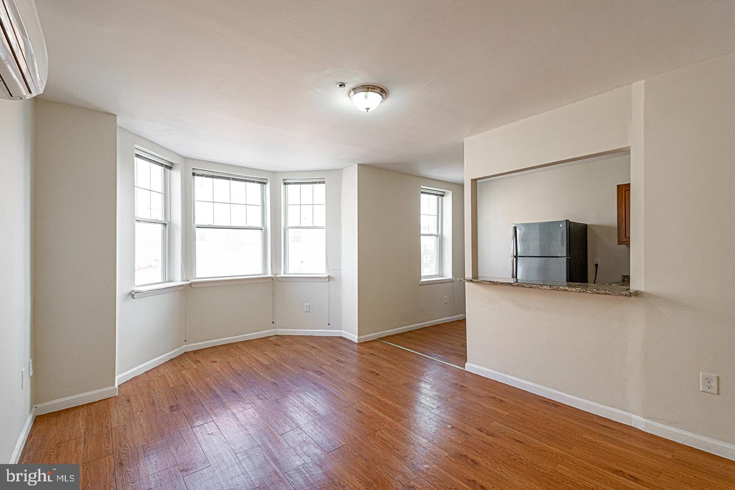 Don’t miss this 3 bedroom, 1 bathroom apartment conveniently located one block from the Broad St Line subway and two blocks from Temple University Hospital! As you enter the unit, you’ll see a sun filled living room with hardwood floors, and the kitchen featuring a window with a breakfast bar, granite counter tops, and stainless steel refrigerator, microwave and electric range. Down the hall are three spacious bedrooms, each with a closet and ceiling fan. You control the air/heat with a mini split system in each room! The full bathroom at the end of the hall has a shower/tub combo and double vanity sinks. All tenants have access to the fitness center and coin operated laundry in the basement.
*Sorry, no pets
*Photos of an identical unit in the building