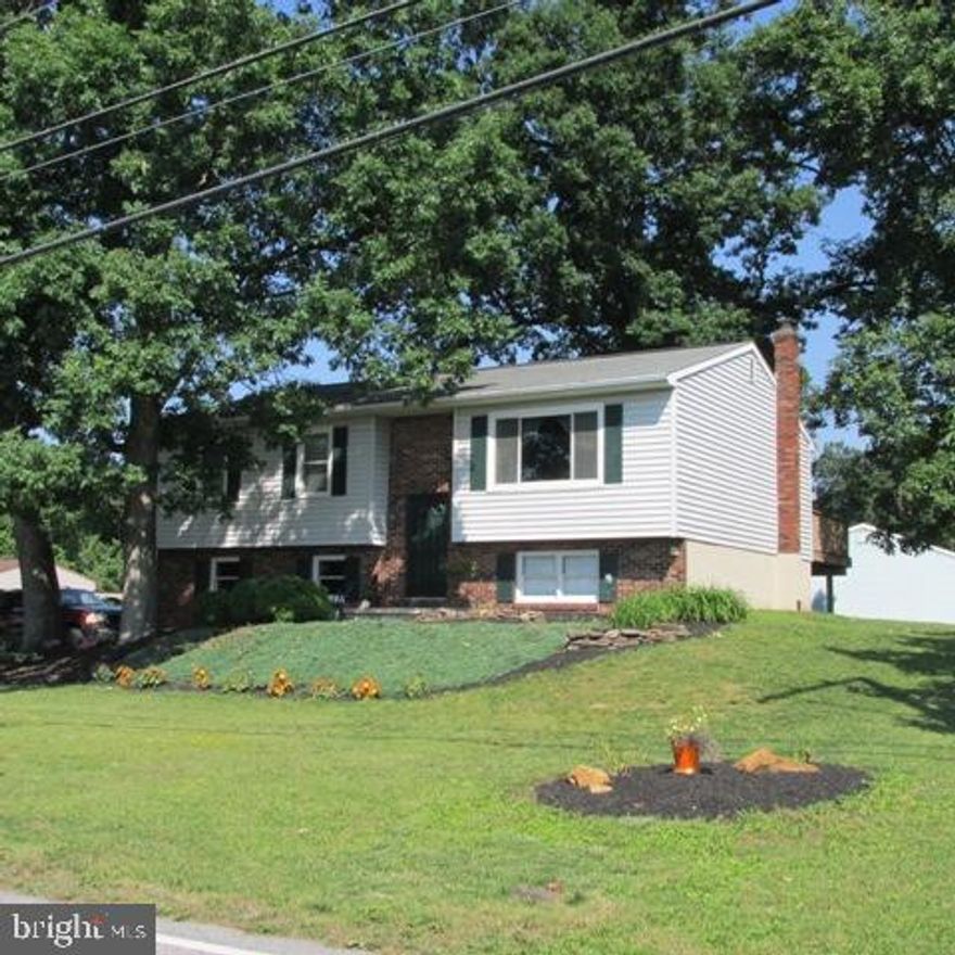 Nice bi-level home right outside of town!  3 bedrooms, 1 1/2 baths, family room, central air and a nice deck!  Mature shade, 2 car garage, and a paved drive.  Check the uploaded list of the many updates throughout the home that have been made.  Great move up or 1st time buyer home.  All under $200,000!  Call today!