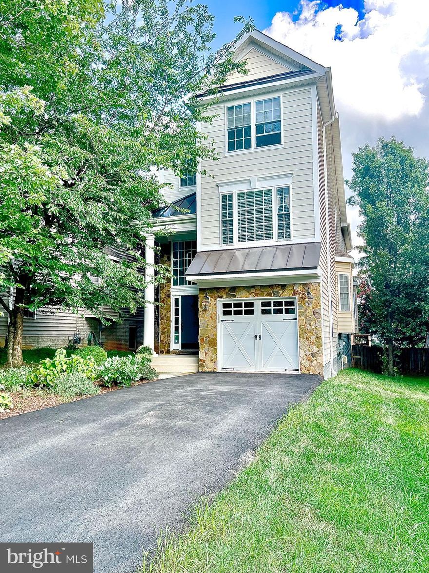 Tucked-away gem just minutes to Metro in sought after Ellison Heights! Welcome to this bright and beautiful Craftsman-style meticulously maintained home. Open 4 level floor plan reveals 4 primary suites, tall 9'&10'ceilings,  plus loft!  ideally nestled on a quiet cul-de-sac just 0.6 miles from the Metro, perfect for commuters and city explorers alike. With great curb appeal and charm to spare, this home offers a rare blend of privacy and convenience.

Step inside to soaring ceilings and sun-filled spaces. Elegant welcoming 2 story foyer wrapped in windows. Lower level includes private bedroom & full bath and large recreation room with tall ceilings & recessed lighting. Kitchen with breakfast area plus pantry with deck access for easy BBQ. Family room off kitchen with charming built-in bookcases and cozy fireplace.  Formal dining area with bay window spacious enough for the largest of gatherings. Loft is perfect for office or overflow family room area.  Bedroom level with hardwood floors includes the primary bedroom with sitting area, luxury spa like bathroom and huge walk-in closet. Convenient laundry on bedroom level. Two other spacious bedrooms, each with their own bathrooms, finish off the upper levels. The fenced, level backyard is a dream for pets & play, and the spacious deck is ready for your next BBQ bash or lazy Sunday lounging. Additional exterior highlights include a stylish stone façade,  garage parking + driveway for multiple cars. Haycock ES-Longfellow MS-Mclean HS pyramid! Whether you're hosting or relaxing, this home is made for you!