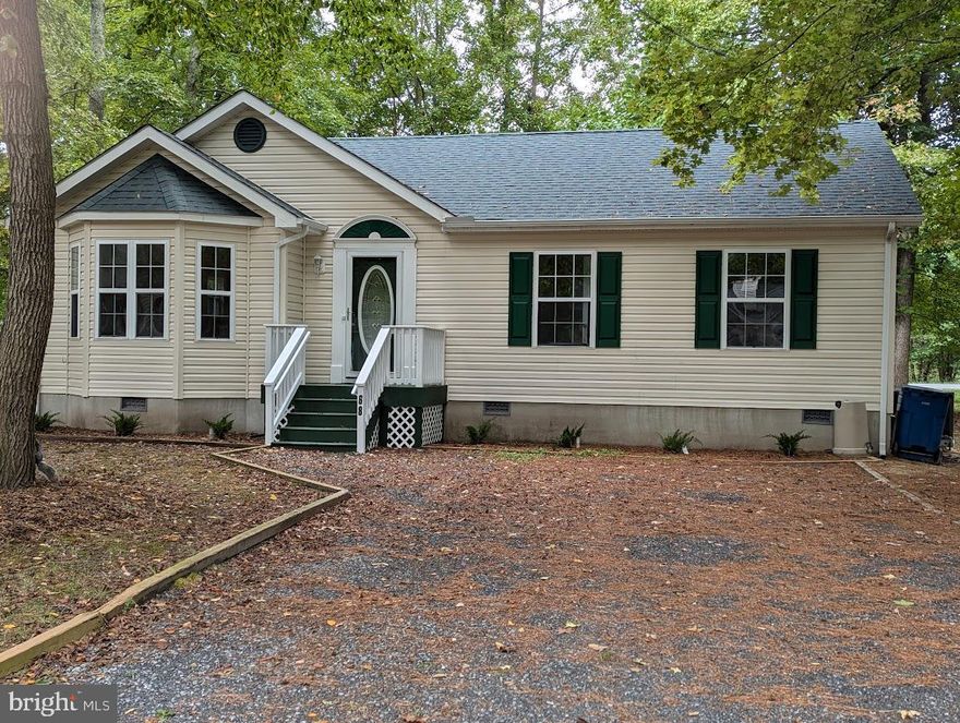 Make this cottage at the beach yours. This 3-bedroom, 2-bath home could be a great getaway or year-round home. Tile floors in the main living area make for easy clean up and new carpet in the bedrooms provides quiet. The vaulted ceilings add to the roomy feel. This home has a fenced in backyard and a storage shed. The roof was newly installed in September 2024. Come take a look and see if this home will work for you.