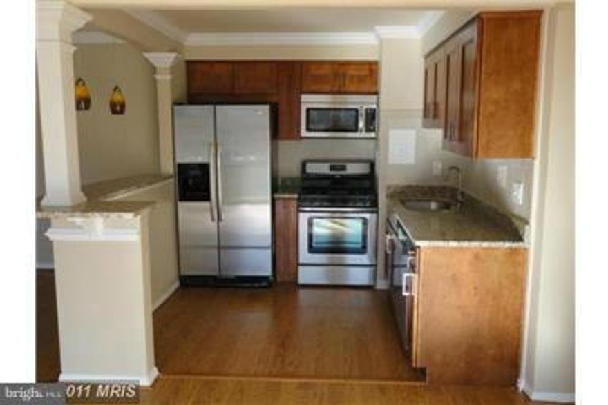 3 BEDROOM, 2 FULL BATH CONDO ON THE TOP FLOOR. QUIET CORNER UNIT WITH A GREAT VIEW FROM EVERY ROOM. HUGE BALCONY AND RECENTLY RENOVATED, NEW APPLIANCES, NEW GRANITE COUNTER TOP. COMES WITH A HOME WARRANTY. MOST UTILITIES ARE INCLUDED IN CONDO FEES.