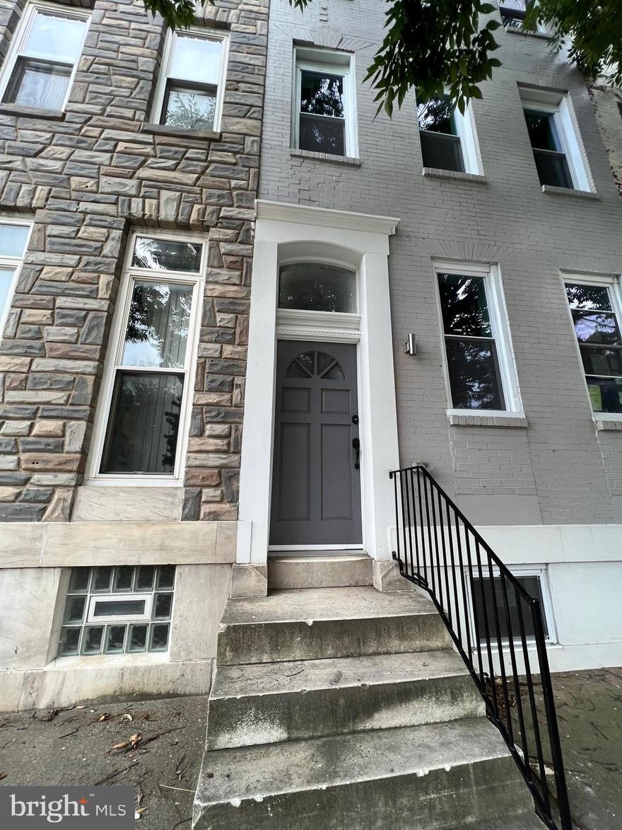 This contemporary renovation spares no imagination. Completely rebuilt from top to bottom, the building offers the luxury of individual living on 3 separate floors. Each individually metered for electricity and offering a washer/dryer in each unit.  Gorgeous kitchen and hardwood floors throughout.  Come and see for yourself, you would love this. SOLD AS IS

Parking pad in the back.