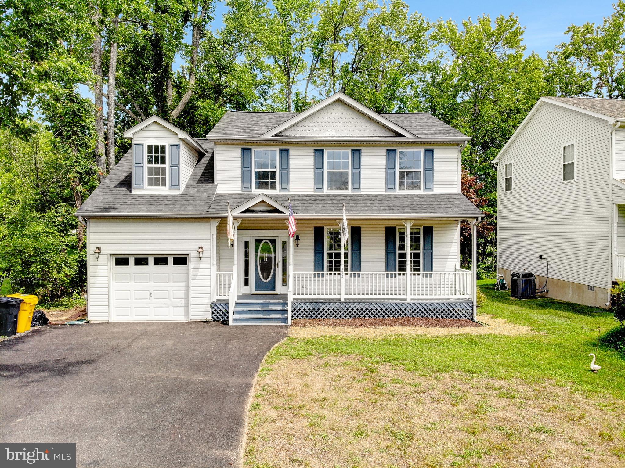 Discover the charm and beauty of this adorable waterfront home in the highly sought-after Loch Haven community! Thoughtfully updated and boasting water views and a private pier, this 4-bedroom, 2.5-bath home is designed for comfort, style, and outdoor enjoyment. Step inside to find a beautifully upgraded kitchen, featuring granite countertops, stainless steel appliances, ample storage, and a spacious island—perfect for entertaining. The cozy family room, complete with a gas fireplace, offers tranquile water views, creating the perfect space to relax and unwind. A formal dining room overlooking the water provides an inviting setting for both family gatherings and casual meals. The main level also includes a generous living room and a stylish half bath, completing the ideal layout. Upstairs, the primary suite is a true retreat, with gorgeous water views and an updated en-suite bathroom featuring a new vanity, flooring, and mirror. Three additional spacious bedrooms and a full bathroom complete the upper level, along with a conveniently located laundry area. Step outside onto the deck and experience the true waterfront lifestyle! This home features a private pier, perfect for kayaking, canoeing, or paddle boarding in a protected cove. The newly paved driveway provides ample parking, along with an oversized one-car garage offering excellent storage space. A brand new roof was just installed. Located in the amenity-rich Loch Haven community, residents enjoy access to a community marina, sandy beach, tot lot, tennis courts, pickleball, basketball, volleyball, and scenic hiking trails at the Farm Park. Plus, enjoy the convenience of nearby shopping, dining, and commuter routes. Don’t miss this incredible opportunity to own a waterfront gem in Loch Haven—schedule your private tour today!