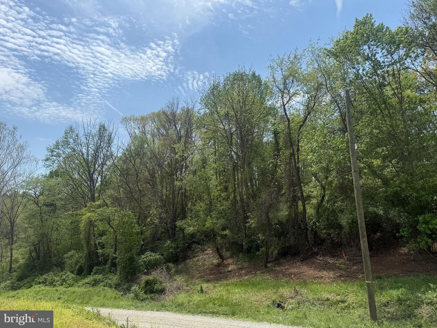 Welcome to your slice of paradise- Lot 3 on Brenneman Rd., in Southern York County School District. 2 Lots allowing for you and a family member or friend to build side by side! This elevated, partially cleared lot offers peace, privacy, and beautiful opportunity on 1.7 acres. The Perc has already been completed, driveway has been cut in (permit in hand), and proposed well has been located. This lot also has a beautiful roadside stream, great land for small animals, and is close to  I-83. Property has some restrictions for size minimums as well as construction finishes. Bring your builder or choose from one of our builder's floor plans! Please don't walk the land without an appointment with your agent.