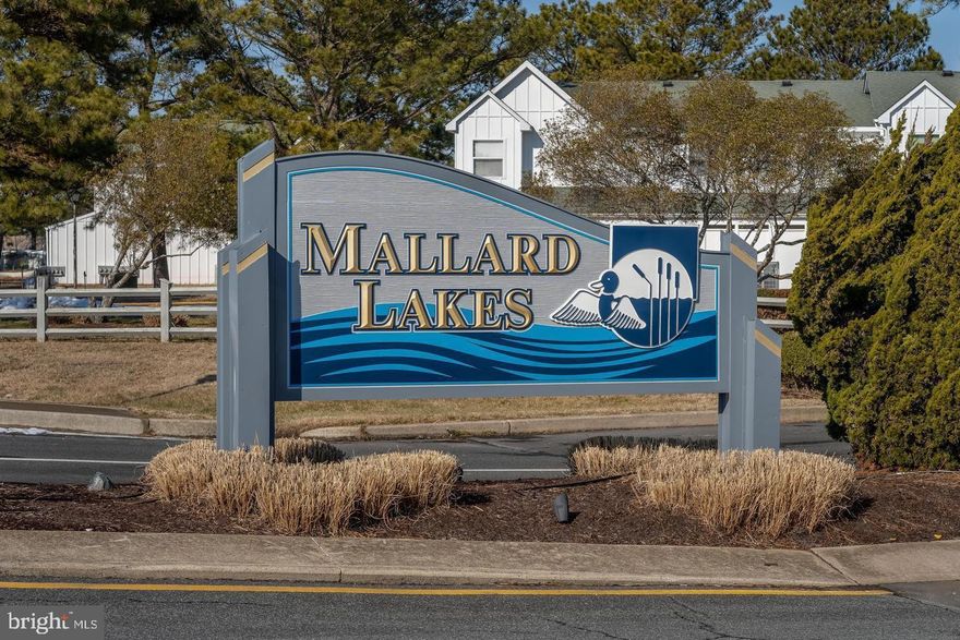Welcome to 37781 Heron Ln #434, a beautiful, newly updated townhome with a tranquil view of one of the many ponds throughout  the desirable Mallard Lakes community in Selbyville, DE—a charming coastal Delaware beach town just minutes from Fenwick Island and Ocean City, MD. This area offers the perfect blend of small-town charm and beach town energy, with walkable eateries, and easy access to sandy shores, boating, and fishing. This attractive home  boasts a spacious open-concept living, filled with abundant natural light. There is LVP flooring on the first floor and recently added LVP in the bedrooms and closets. Featuring an accommodating kitchen with newly painted cabinets a granite counter top, bluetooth ceiling fan and a convenient breakfast bar, ideal for casual dining or entertaining guests while preparing a delicious meal. The combined living and dining room is well lit and spacious, perfect for accommodating your beach guests. The living/dining room opens up to the gorgeous screened in porch . Two generously sized bedrooms provide ample space and comfort for resting up after your sun-filled beach day and are complemented by plenty of closet storage for convenient living. The full bath on the second-floor  features a soaking tub and large shower, newer vanity and lighting. The just completed renovations include new flooring and painting throughout, new light fixtures and ceiling fans, and updated bathrooms. The HVAC and Hotwater Heater are just a few years old.  From your private sidewalk you can hangout on you front porch and watch the tennis players.  Convenient outdoor shower and plenty storage for all of your beach gear and bikes.  Life at Mallard Lakes is truly resort-style, with an array of amenities to enhance your lifestyle. Residents enjoy outdoor pools, relaxing jacuzzis, pickleball and tennis courts, shuffleboard, walking trails, basketball and volleyball courts, playgrounds, horseshoe pits, a panoramic viewing tower, and even kayaking areas. Whether you're looking for relaxation or recreation, this community has something for everyone. Perfect for year-round living or as a weekend beach getaway,