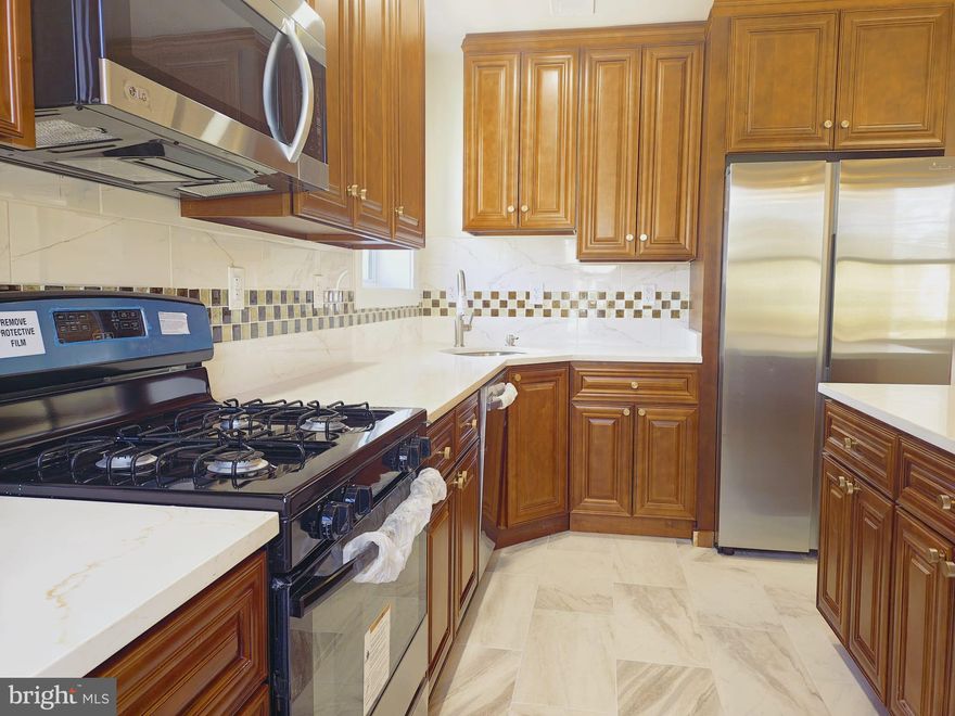 Fully Renovated 1-Bedroom Apartment in Congress Heights – Unit 204

Experience modern living in Unit 204, a fully renovated one-bedroom, one-bathroom apartment on the second floor of a professionally managed multi-unit building in Congress Heights. While the building retains its classic charm, all units have been completely updated to offer a fresh and contemporary living space.

Apartment Features:

- Full kitchen with brand-new stainless steel appliances
- Kitchen island for extra counter space and seating
- In-unit washer and dryer for added convenience
- Hardwood flooring throughout for a sleek and modern look
- Central heat pump for efficient heating and cooling
- Units wired for FIOS and coax services

Building & Community Amenities:

- 24/7 CCTV monitoring in all common areas for enhanced security
- Fenced and gated property for added privacy and safety
- Electronic building access and front entry intercom system
- ADA-accessible wheelchair lift for easy accessibility
- Bus stop right outside the building for easy commuting
- Major chain grocery store just a few miles away
- Coming soon: an in-patient and out-patient hospital just a few blocks away

The property also offers four parking spots for rent at $150 per month on a first-come, first-served basis. Residents will enjoy easy access to public transportation, shopping, dining, and major highways, making commuting and daily errands effortless.

Don’t miss the chance to live in a beautifully renovated, secure, and well-connected apartment. Contact us today to schedule a viewing!