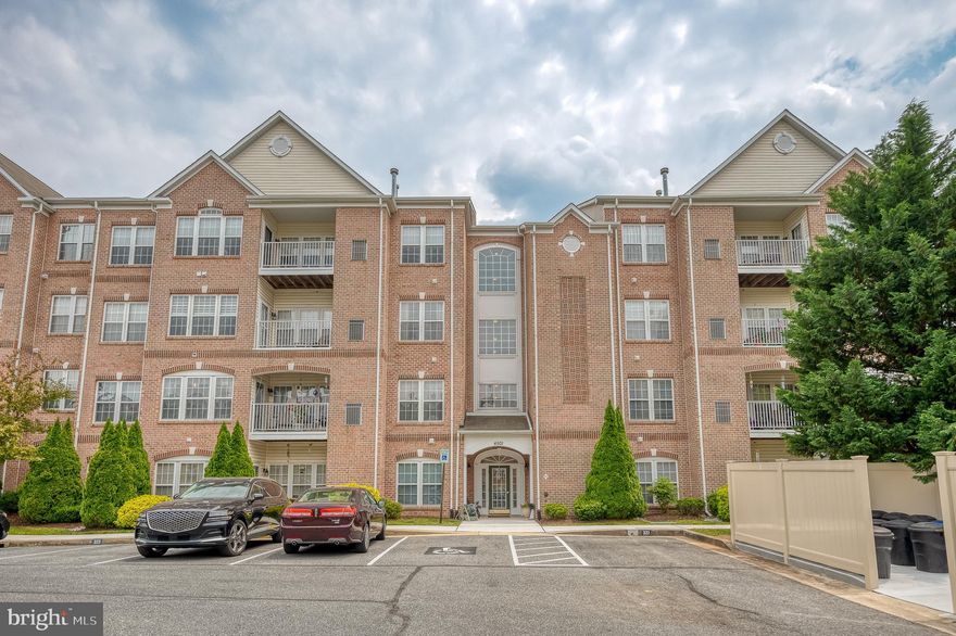 Welcome to the desirable Perry Hall Farms Condos! This convenient main level entry condo with nine-foot ceilings has a cozy porch and private direct access to the unit.  New luxury vinyl plank flooring was installed throughout and you'll find neutral wall colors. The eat-in kitchen has a breakfast bar, table space/breakfast area, double sink and is open to the large living room - with BRAND NEW stainless steel appliances. You'll find two large bedrooms: The private primary suite has a sitting room and en suite bath with jacuzzi tub along with a huge walk-in closet. The second bedroom - on opposite wing of the home - is ideal for guests, providing a hall bathroom just outside the bedroom door. There is a separate dining room with crown and chair molding. Laundry is situated just steps away from the primary bedroom for convenience. There custom window treatments and ample storage (including hallway storage as well). This quiet street is just minutes from shopping, restaurants, and more. The community has sidewalks as well as four parks within a few minutes.