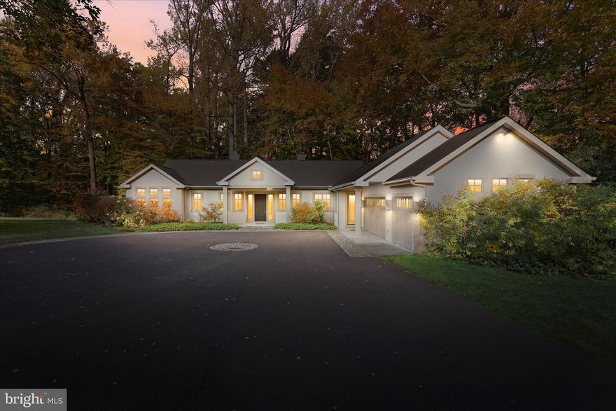 Discover an elegant, meticulously crafted home with a charming contemporary flair, nestled on the private lane of Selborne Drive, surrounded by estate properties and lush open space. This unique residence boasts a mailing address of 55 Selborne Drive, Centerville, Delaware 19807, while its physical address is in Chadds Ford, Pennsylvania.
As you pass through the serene privacy gate and meander along the tree-lined lane, you'll be welcomed by this inviting 3-bedroom, 2.5-bathroom home, complete with a beautifully crafted covered front door and an oversized three-car garage, quietly perched on an 8-acre lot.
Step inside to a bright foyer that leads to a welcoming living room, featuring a wood-burning fireplace, built-in cabinetry, recessed lighting, skylights, and soaring 9-foot ceilings. The elegant hardwood flooring extends throughout the main level, while tall Pella glass doors and expansive windows invite an abundance of natural light. The durable IPA wood deck, complemented by a contemporary Viewrail cable railing system, offers sweeping views of the picturesque wooded surroundings.
On one side of the living room, the main-level primary suite boasts stunning views, recessed lighting, and two spacious walk-in closets, along with a cozy office/study filled with windows. The luxurious four-piece primary bathroom features double sinks with quartz countertops, a tiled shower, a soaking tub with a tiled surround, and a water closet.
On the opposite side, the bright and airy dining room, complete with pocket doors and backlit glass shelving, provides dual access to the rear deck area. The expansive eat-in kitchen is a chef's dream, featuring an oversized center island, floor-to-ceiling backlit Mahogany cabinetry, beautiful Limestone countertops, stainless steel appliances, and large windows that fill the space with light. This area also offers direct access to the entertaining space on the deck.
Adjacent to the kitchen, a convenient mudroom/laundry room connects to both the glamorous three-car garage and an outside entrance. The lower level showcases Brazilian cherry flooring and recessed lighting throughout. The spacious family room, with its fireplace and twin built-in cabinetry, is perfect for gatherings. Two additional bedrooms feature large closets, and a full bathroom serves this area. Additionally, there’s a second laundry area and an unfinished basement with a garage door leading outside.
This remarkable property is situated in one of the most desirable locations straddling the Delaware border, close to Wilmington, West Chester, and Philadelphia, and is part of the award-winning Unionville-Chadds Ford School District. Experience the unparalleled lifestyle this home offers!