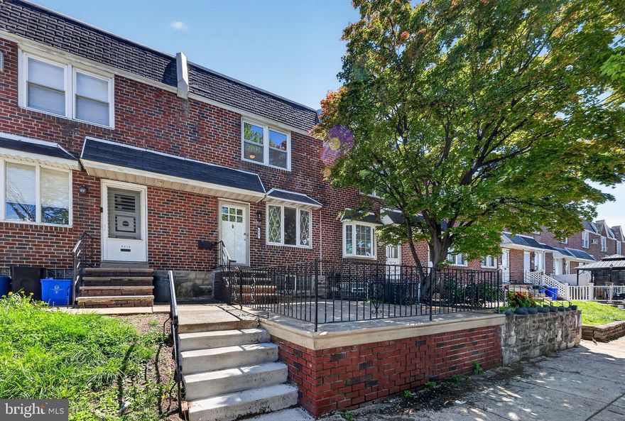 Welcome to this beautifully updated home in the heart of Tacony! This move-in ready property features refinished hardwood floors, fresh paint, recessed lighting, and classic 6-panel doors throughout.
The brand-new kitchen offers an open look, stainless steel appliances, tile backsplash, new floors and modern finishes.  The finished basement with a powder room provides extra living space and a seperate area for wash and utilities.  Other Major updates include a brand-new HVAC system and a roof that was sealed and recoated in 2026. Enjoy outdoor living with a new Trex deck, fenced yard, and front patio. Complete with a 1-car garage and new front storm door, this home is conveniently located near shopping, dining, and public transportation.