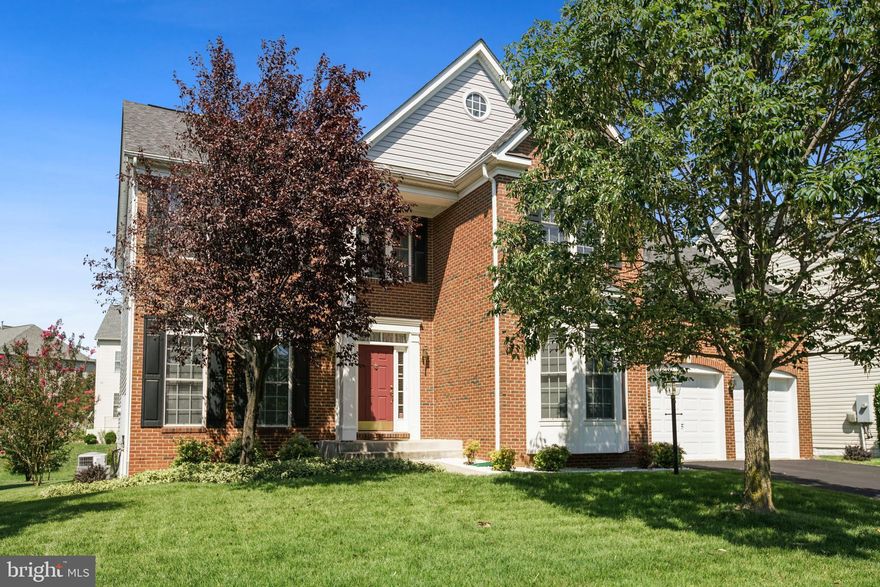 Transitional brick-front home with interesting architectural accents beyond the common colonial. Loaded with high ceilings, tall windows, recessed lighting, and a neutral interior, this home feels classic with an exciting boast of contemporary flair! Here are over 4,000 square feet of quality living that have been SMOKE AND PET-FREE since it was built! Welcoming 2-story hardwood Foyer through covered Portico entry. Gracious front-to-back Living and Dining rooms with column accents. The main level Library, thru a French door, with a bay window, is the perfect in-home office. Well-appointed Kitchen designed with beauty and function in mind! Tall ample cabinetry, countertop space, and stainless appliances are balanced around the large Center Island. The planning desk and walk-in Pantry help with daily life. Breakfast area set in box window bump-out. The oversized Laundry Room has garage access and is finished nicely with wall cabinets, open shelves & sink nook. The big comfy Family Room features open floor space, a gas fireplace, and a wall of windows. Here is the gathering spot for friends and family time! Flat open lush lawn Back Yard ready for your vision of outdoor living. Impressive Primary Bedroom Suite offers a huge bed area, deep walk-in closet with plenty of room to share, and a “bedroom-sized” Sitting Room! Double doors added to this room allow for flex uses—nursery, 2nd office, or perhaps a glamorous wardrobe. En-suite Bath offers lots of neutral tile surrounding two sink vanities, a glass step-in shower, and an inviting jetted soaking tub set under corner windows. Three generous-sized guest Bedrooms, one with a walk-in closet, share a large hall Bath featuring a smart double sink vanity and enclosed private shower and lavatory. The finished walk-up Lower Level enjoys a Recreation Room with a gas fireplace and a built-in refreshment center. Flex room allows for fitness or a guest room with full Bath convenience. It’s unusual to talk much about storage areas but this home stands out in its design to maximize storage and hobby/craft space. The rare walk-in Pantry with built-in shelving ensures the necessities and bulk item supplies stay well-stocked. The Hobby/Workshop area has custom built-in wall and floor cabinets with countertops plus a utility sink. Move Right In & Enjoy!