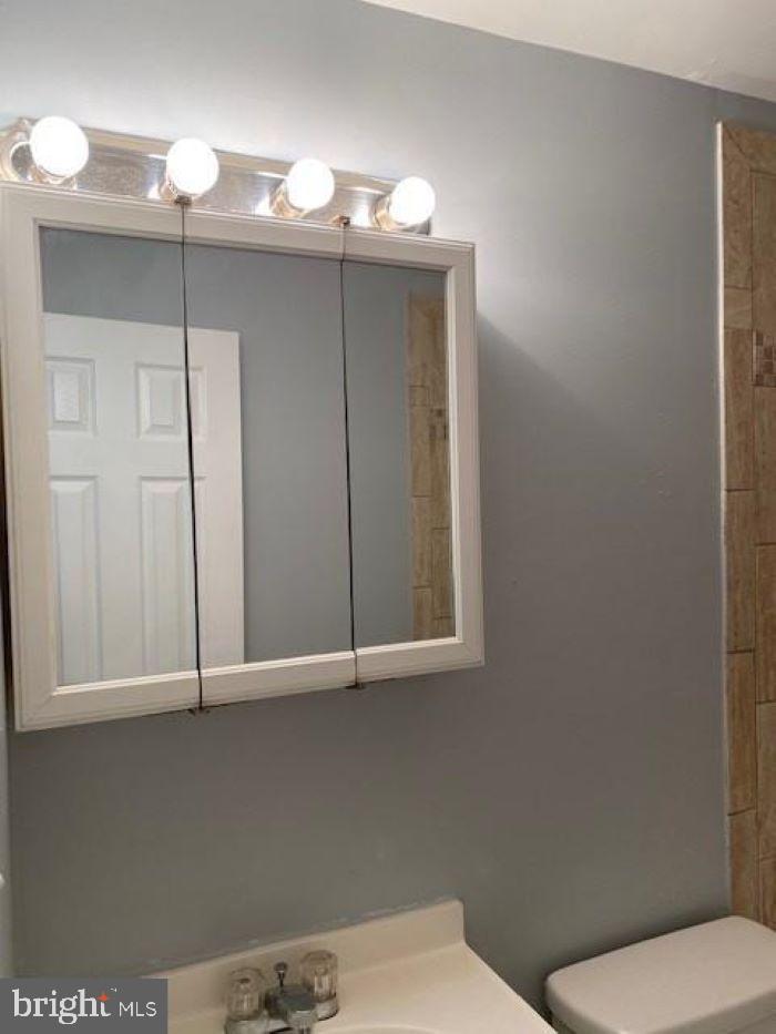 WARFIELD CONDOMINIUMS - Residential Lease