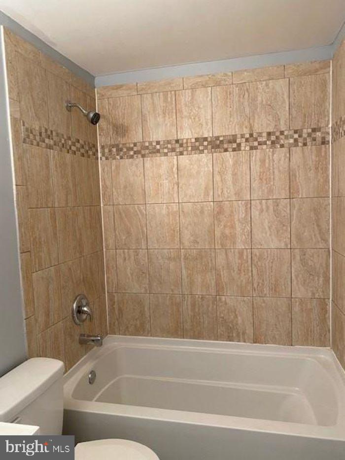 WARFIELD CONDOMINIUMS - Residential Lease