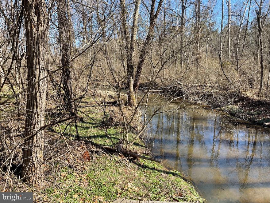 This beautiful mostly wooded lot has 2 streams that come together-a small stream feeds into Whites Run that flows through the middle of the property. The front of the lot is elevated and runs along Ted Kesecker Rd. Providence Church Rd runs along the side of the lot. The property is unrestricted, and the current owner had cows there. There is 1 run in shed.  Build a home, a hunting cabin, or use as a recreation property. No perc test has been done. There is no plat available so buyer would need to do their own due diligence. Please do not walk the property without being accompanied by an agent who will have additional instructions for showing.