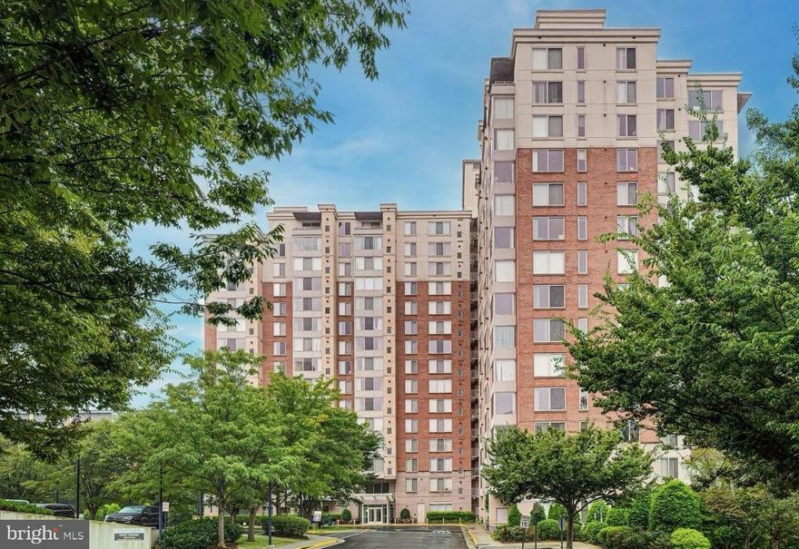 ***MUST SEE *** Rare opportunity to own the largest and most desirable corner unit, ideally located across from Dunn Loring Metro and Harris Teeter, and just a 10 minute walk to the Mosaic District’s dining, retail, and entertainment.
Located on the 11th floor, this light-filled residence showcases oversized windows with expansive views, and a bright open layout designed for comfortable everyday living. Freshly painted and enhanced with engineered wood flooring and ceiling fans, the home offers a clean, inviting feel.
The gourmet kitchen features granite countertops, stainless steel appliances, and ceramic tile flooring, flowing seamlessly into the main living space. Two spacious bedrooms and 2 full bathrooms include walk-in closets and an in-unit washer and dryer for added convenience.
Enjoy two assigned garage parking spaces on level P1 near the entry for easy access, plus a secure storage unit.
Wilton House offers a full-service lifestyle with premium amenities including a rooftop pool and terrace, fitness center, 24-hour concierge, on-site management, package room, business center, party room, and lounge.
Commuters will appreciate quick access to I-66, I-495, and Route 50, with close proximity to Tysons Corner, Reagan National Airport, and Dulles International Airport.
Experience the perfect blend of space, style, and urban convenience in one of the area’s most connected and sought-after communities.