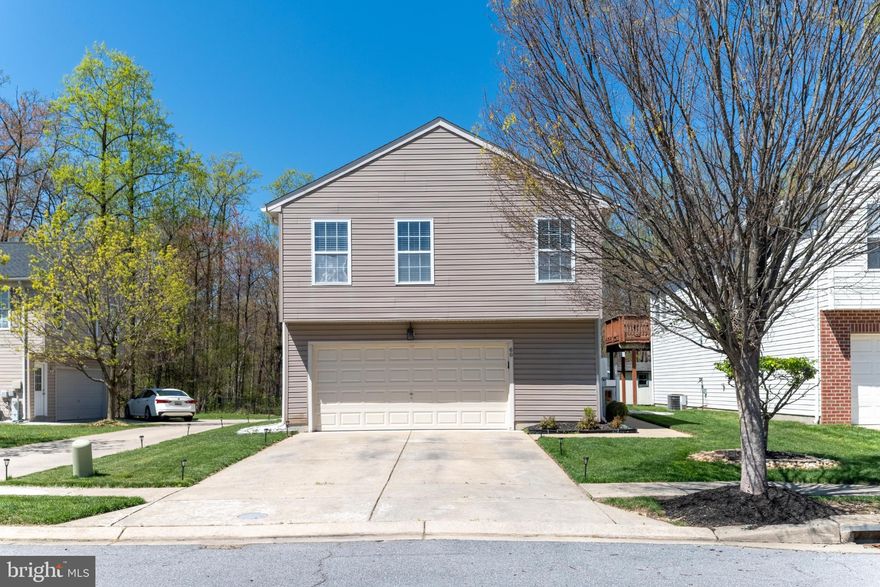 Welcome to your dream home in the Rolling Oaks community! This meticulously maintained split-foyer sits perfectly at the end of a cul-de-sac and backs to serene woods, offering the ideal blend of modern updates and natural privacy. Step upstairs to an inviting main level featuring beautiful laminated wood plank flooring that flows throughout the living areas. The spacious living room serves as the heart of the home, highlighted by a stunning stone accent wall with a sleek electric fireplace. Host formal dinners in the separate dining area, which provides seamless access to a premium 6-year-old composite deck. This outdoor oasis faces the private wooded backdrop, making it the perfect spot for quiet morning coffee or evening entertaining. The kitchen is designed for both style and function, boasting stainless steel appliances, recessed lighting, ceramic backsplash, and durable solid-surface countertops, with enough space for a small breakfast table.
All three spacious bedrooms are conveniently located on the main level, each equipped with a ceiling fan for year-round comfort. The primary suite features a private, attached ensuite bathroom, while the additional bedrooms share a full hall bath finished with classic ceramic tile.
The expansive lower level offers incredible versatility, featuring luxury vinyl plank (LVP) flooring in the recreation area, crown molding, and an additional accent wall. This space provides direct access to the backyard and wooded views. You’ll also find a convenient half bath with ceramic flooring and a dedicated utility room with laundry. The two-car attached garage is currently being enjoyed as a game room but can easily be converted back by the new homeowner. Outside, the property features a driveway that accommodates two cars, access to visitor parking, a storage shed, and a new roof installed in 2022 for peace of mind. Located just minutes from major shopping and main thoroughfares, this home offers the perfect balance of seclusion and convenience. Schedule your tour today!